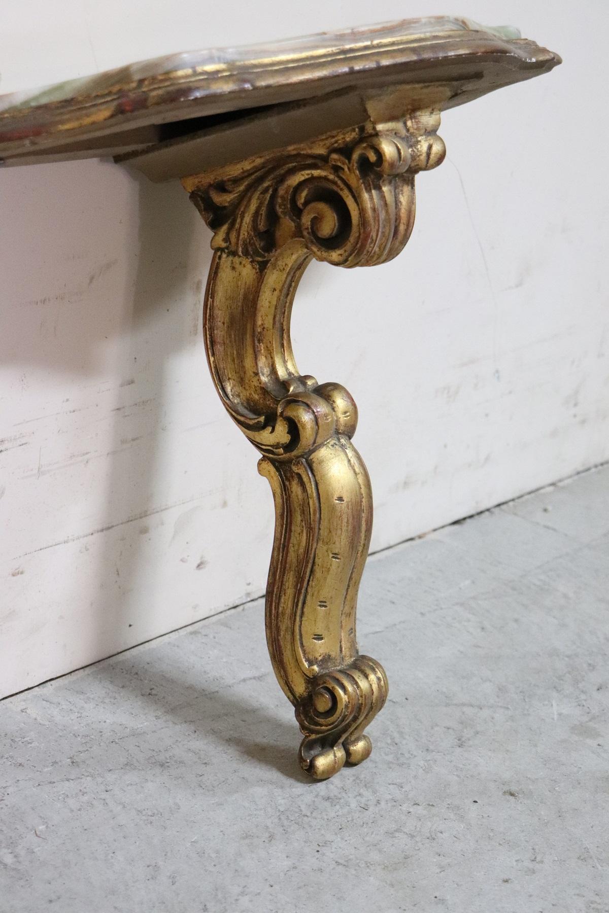 20th Century Italian Baroque Gilded Wood Pair of Console Table with Onyx Top In Good Condition In Casale Monferrato, IT