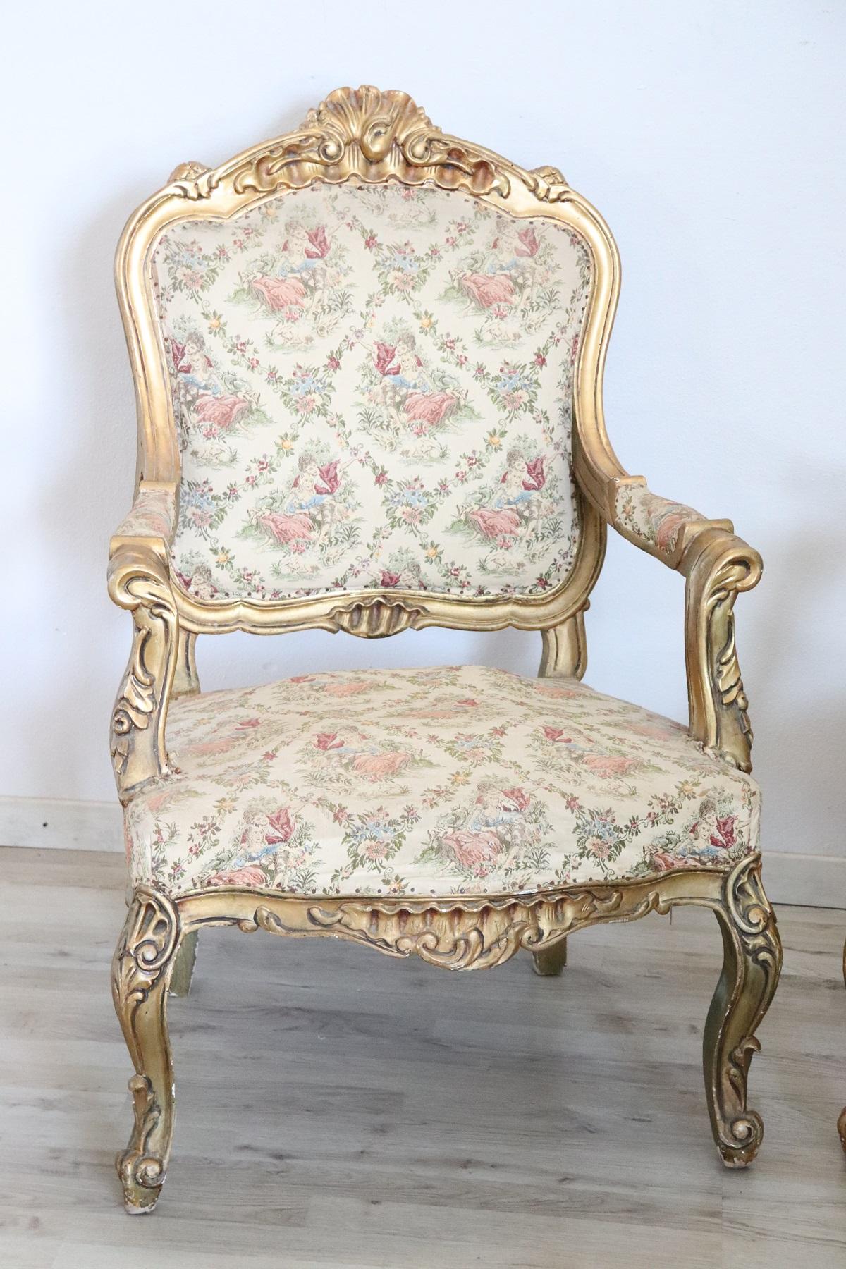 Rare complete Italian luxury Baroque style pair of armchairs in carved and gilded wood
The armchairs comes from an important Italian villa and embellished the hall dedicated to the reception of guests. Used conditions.
 