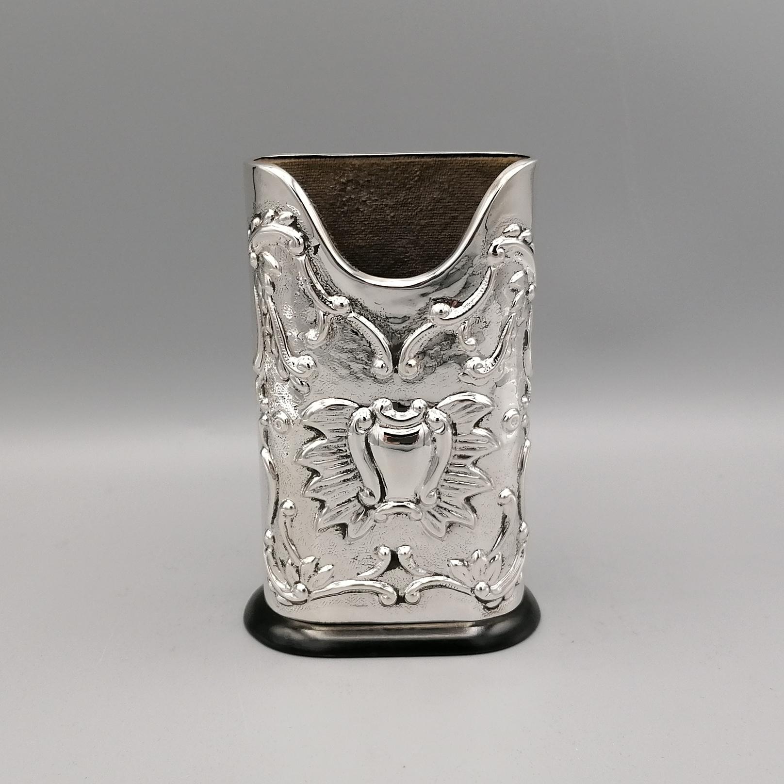 Large, completely handmade, sterling silver pern holder 
Perfect for a prestigious desk.
The pen holder is embossed by hand on both sides with scrolls and floral motifs

By Goldsilver Fani - Florence - Italy
for ARVAL ARGENTI VALENZA.
   