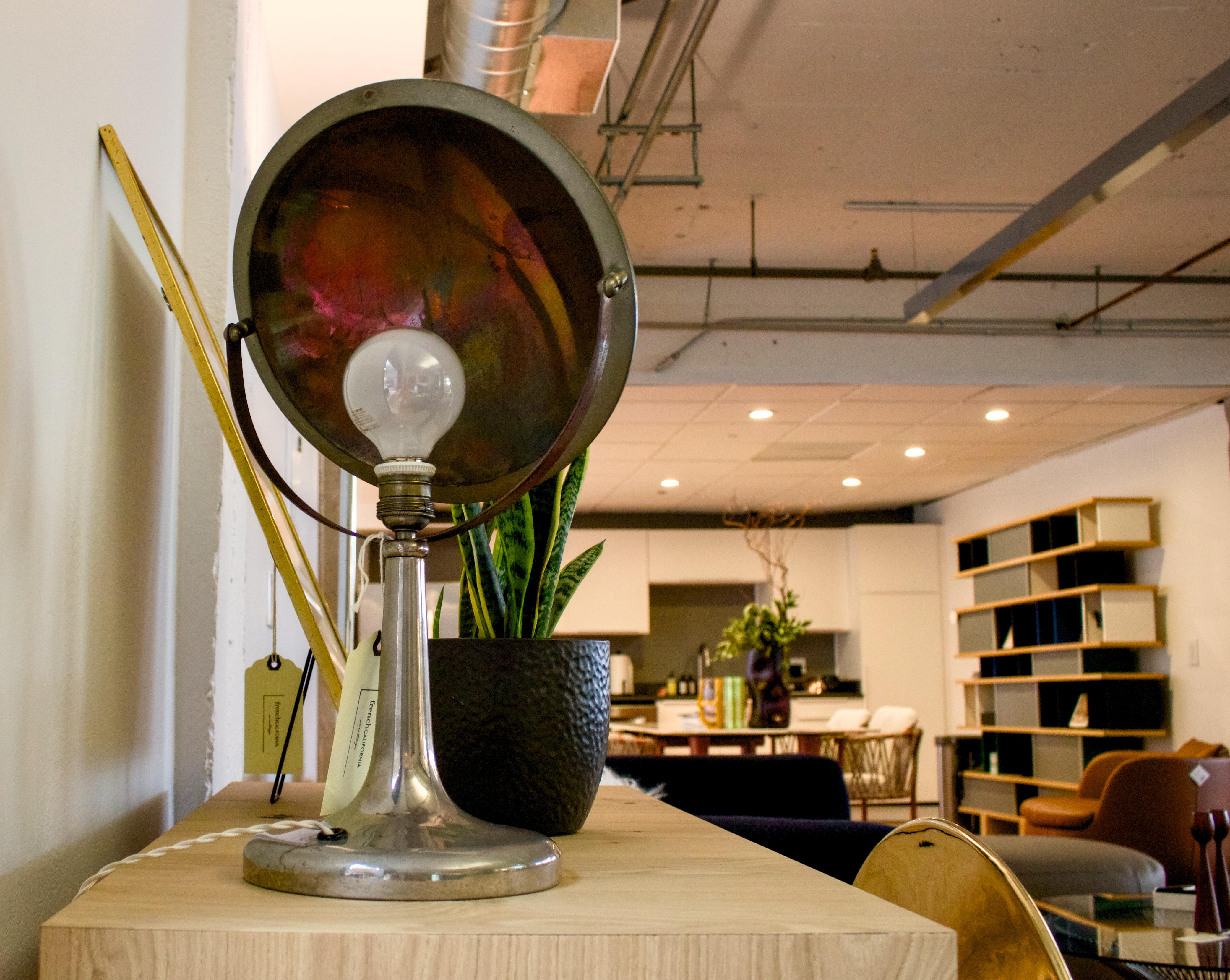 This striking mid-century desk lamp exemplifies the refined European design sensibility of early modernist lighting. Featuring Zerowatt's distinctive PTC design, this Italian-crafted lamp combines bold industrial aesthetics with thoughtful