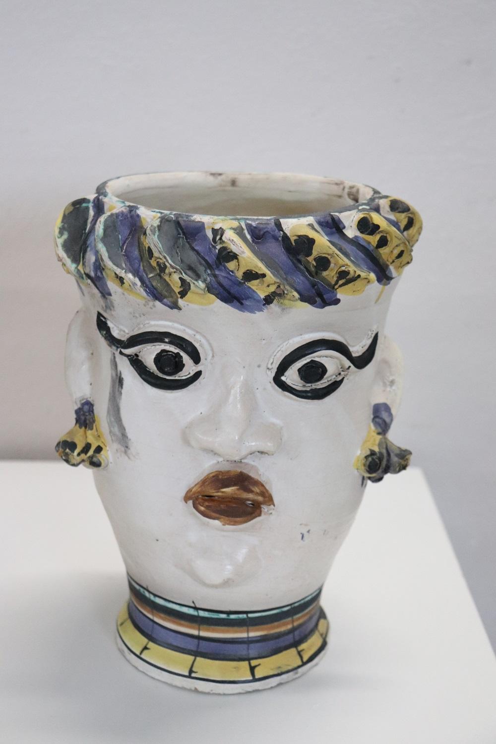 Beautiful vintage vase important Italian ceramic manufacture in Caltagirone, Sicilian city. Particular decoration with the face of a man and a woman. This is a collectible ceramic. See detailed photos.
 