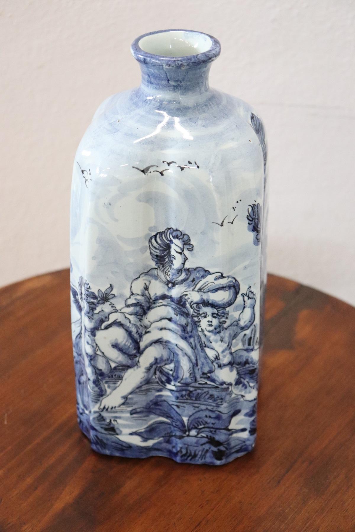 Beautiful vase in polychrome ceramic hand painting decorated in shades of blue. Classical taste decoration. This is a collectible ceramic.
 