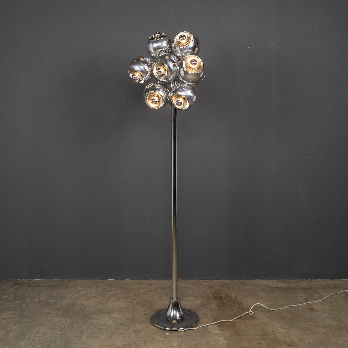 A mid-20th century Italian chrome standing lamp with twelve articulated balls gathered together. An unusual piece of 1960's design.

Condition
In great condition - wear and tear consistent with age.

Size
Height: 176 cm
Width: 60 cm.