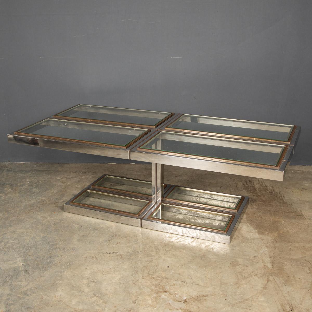 Striking 20th century Italian chromed metal, brass and glass pedestal coffee table, with four glass panels at the foot and four glass panels on the top, made in the 1970's.

Condition
In great condition - wear consistent with age.

Size
Width: