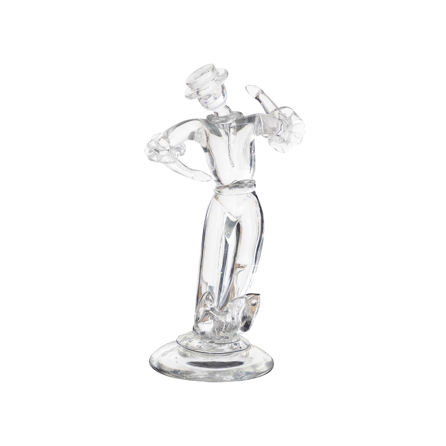 A vintage Mid-Century Modern Italian figure made of hand blown Murano glass, designed by Archimede Seguso and produced by Seguso Vetri D’Arte, in good condition. The clear sculpture is depicting a man in the earlys 20s with a cylinder hat. Wear