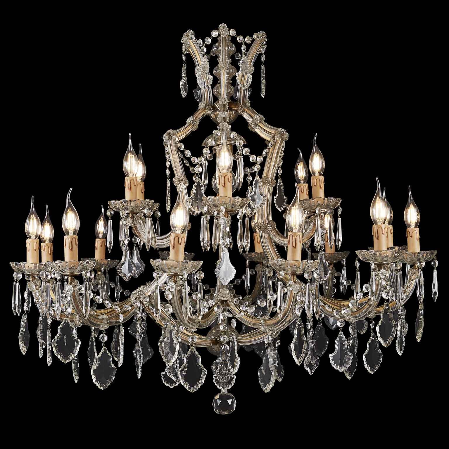 Gorgeous Italian Marie Therese nineteen-light crystal chandelier with a shaped central stem surmounted by beautifully contoured scrolling arms. This lovely two-tier chandelier is in good condition and come from a private palazzo of Milano
