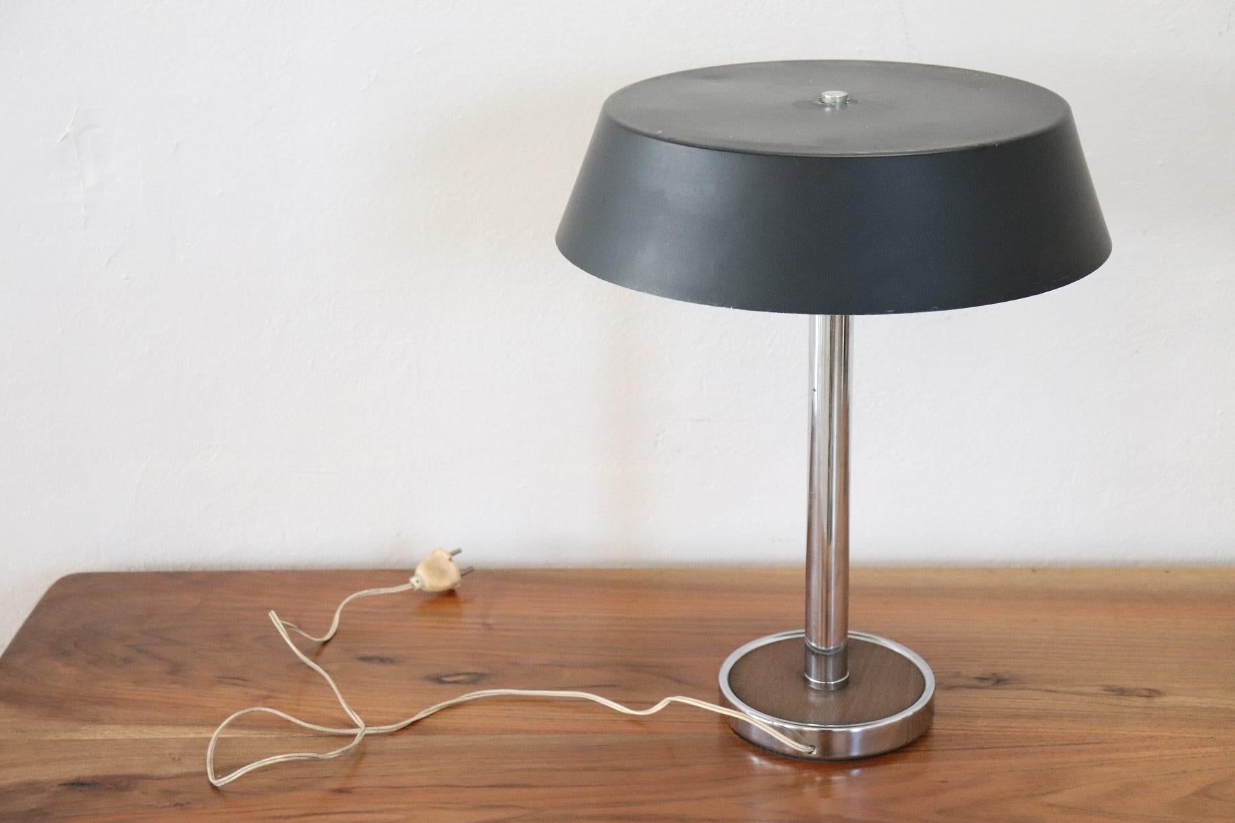 Italian design aluminium table lamp, 1960s, with two lights. Perfect for your bedside table or your desk. Very elegant, for vintage environments. This article is for you at an exceptional price, buy directly from Italy true vintage design! Read our