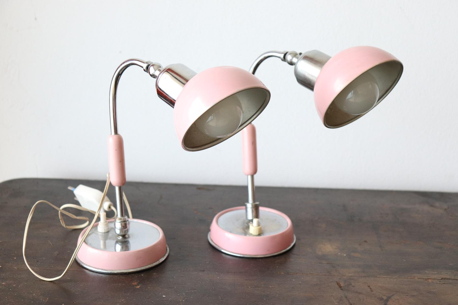Italian design chrome and pink color adjustable pair of table lamp, 1960s. Perfect for your bedside table or your desk. Very elegant, for vintage environments. This article is for you at an exceptional price, buy directly from Italy true vintage
