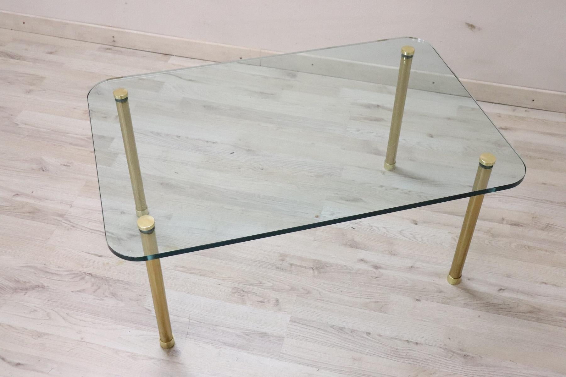 Rare Italian sofa table, 1980s in rare refined crystal with legs in gilded brass. Used, vintage goods conditions.