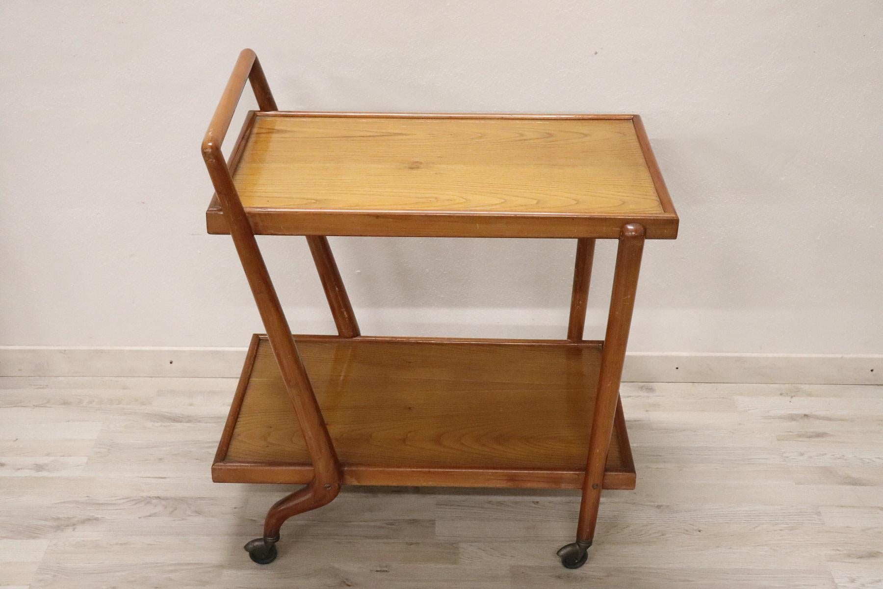 Rare drinks trolley Italian design by Paolo Buffa produced in Italy in the 1940s, It is made of beech wood.
The table have been used conditions. We can provide in our Italian professional laboratories for the complete restoration of wood. You can