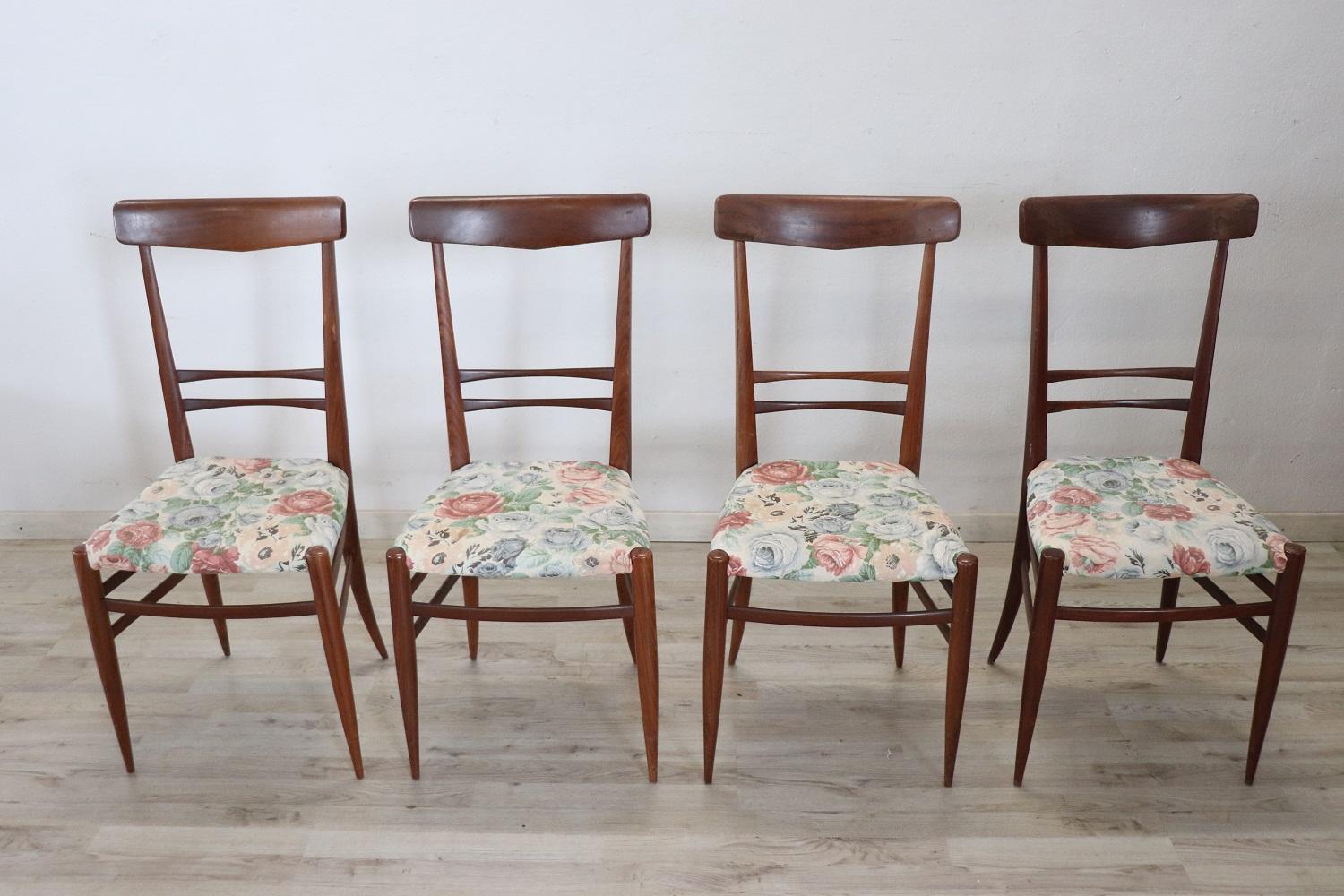 Set of four teak chairs 1950s. These beautiful Italian design chairs are in the style of Ico Parisi. No brand or signature present. Good general condition, there are some old restorations in the back of some chairs. See photos.
