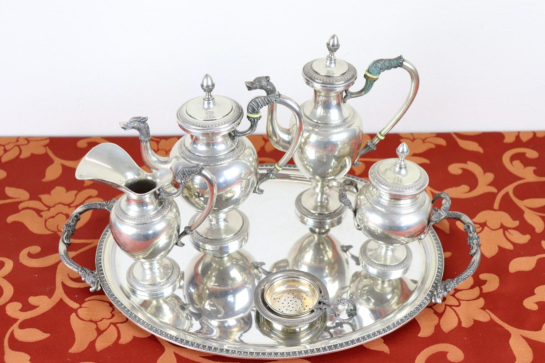 Beautiful service six pieces for tea and coffee in 800 silver marked under the base 1930s approx. Trademark of the Italian manufacturer. Great metalwork with acanthus leaf handles and swan heads. Weight total kg 3,128.