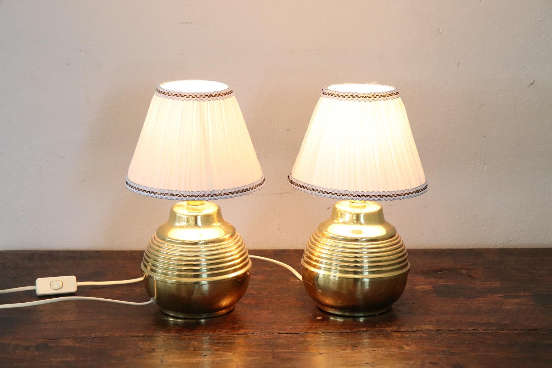 Beautiful Italian table lamp in golden brass, 1980s. Perfectly working.