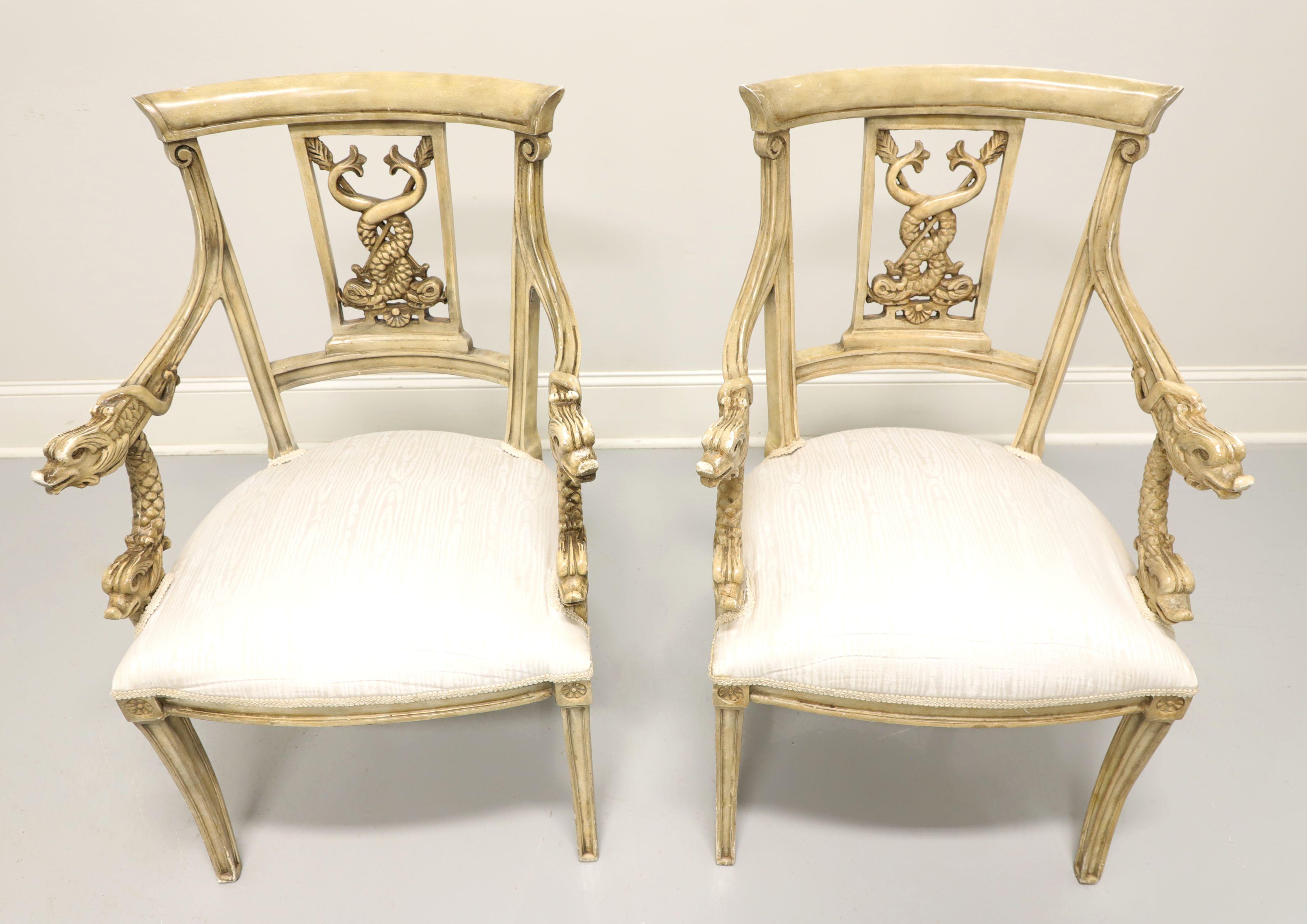 A pair of armchairs in the Italian Impero style, unbranded. Moulded heavy composite material in a pale brown color, smooth crest rail, serpents shaped back rest, serpents head shaped arms, cream colored satin like fabric upholstered seat, medallions