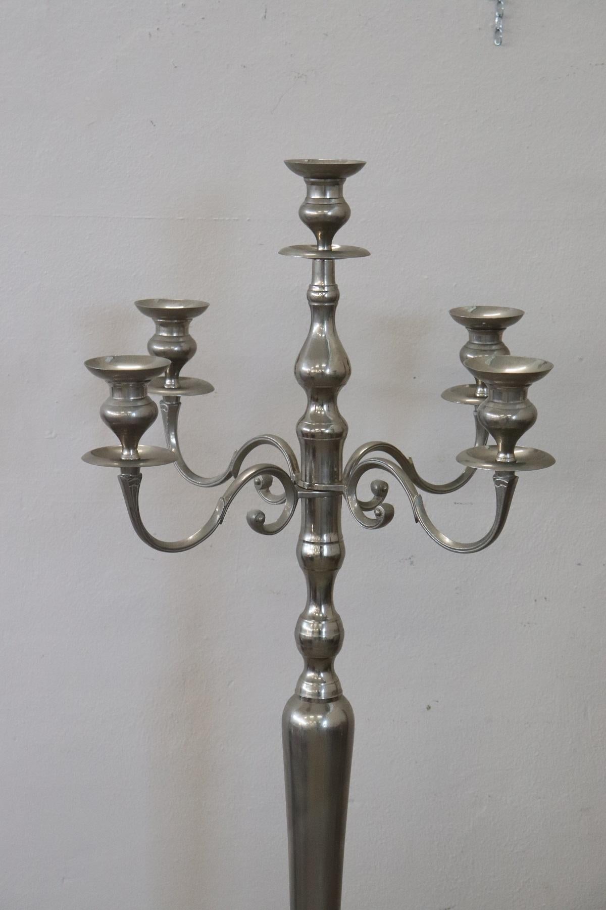 Rare large candelabrum in forged metal with 5-arms for 5-candles. Very special furniture in silver colored metal.