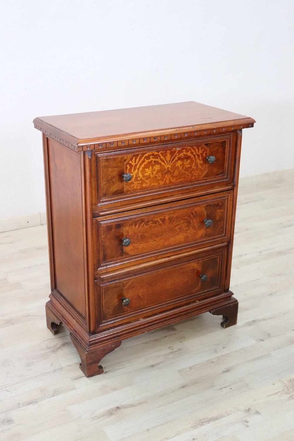 Rare and fine quality Italian Louis XIV style 1950s small chest of drawer in walnut wood. On the front three comfortable drawers. The front of the drawers is characterized by refined wood inlay work. In goods conditions.