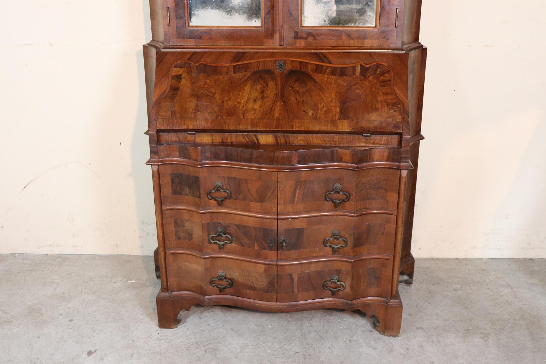 20th Century Italian Louis XIV Style Trumeau, Secretaire in Walnut and Burl 
Double body furniture in carved walnut and burl wood of excellent quality. Trumeau with three external drawers of good capacity. Interior of the fall-front with four small