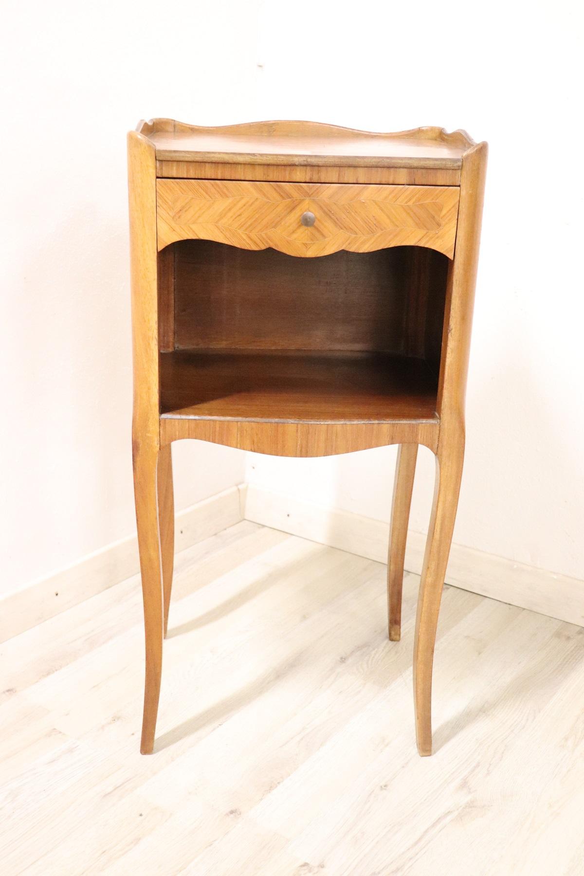Rare and fine quality Italian Louis XV style 1970s side table or nightstand in inlay wood with the particular bean shape, the legs are long and slender. The decoration is on each side so you can place the tables also in the centre of the room. Made