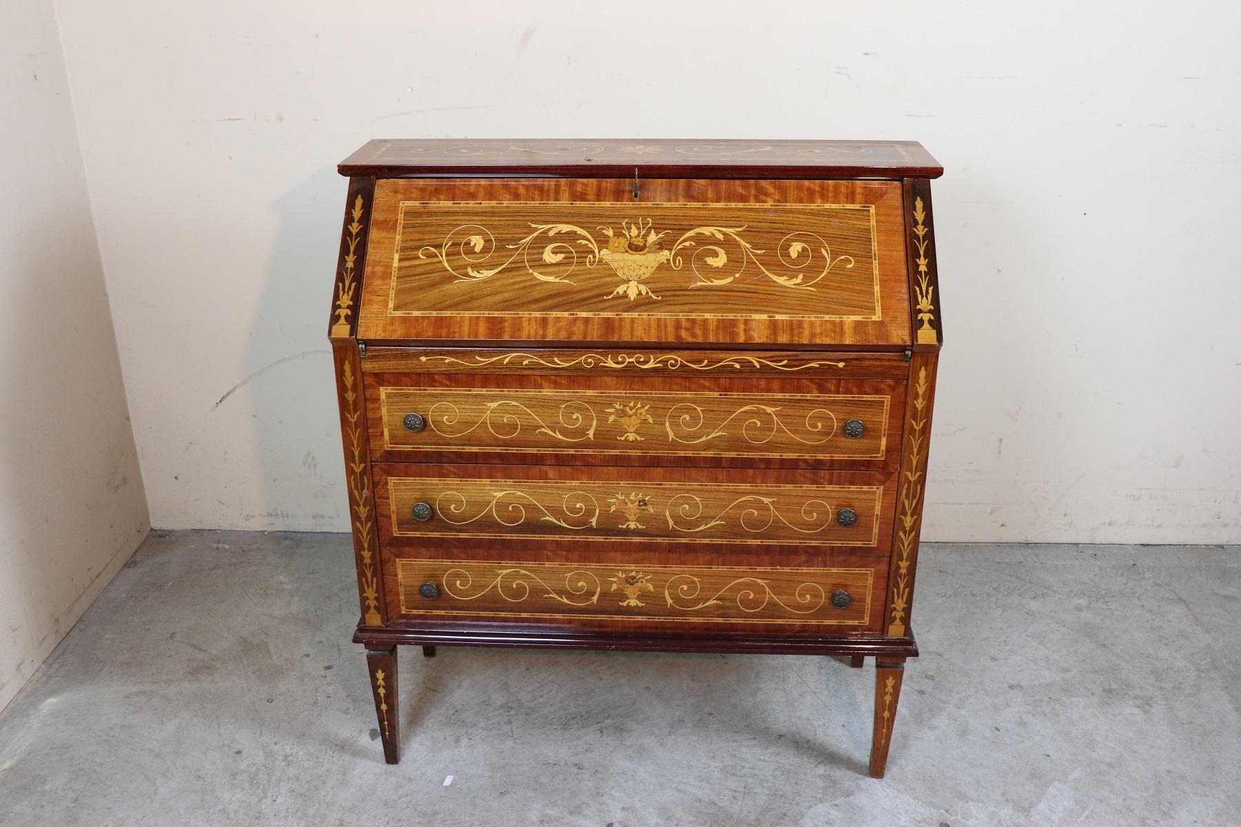 Important elegant chest with secretaire rosewood inlaid with wood essences of various types, full Louis XVI Style period, 1950s. The Rosewood inlay work is extremely meticulous. Work possible only by major cabinet makers. We recommend looking at the