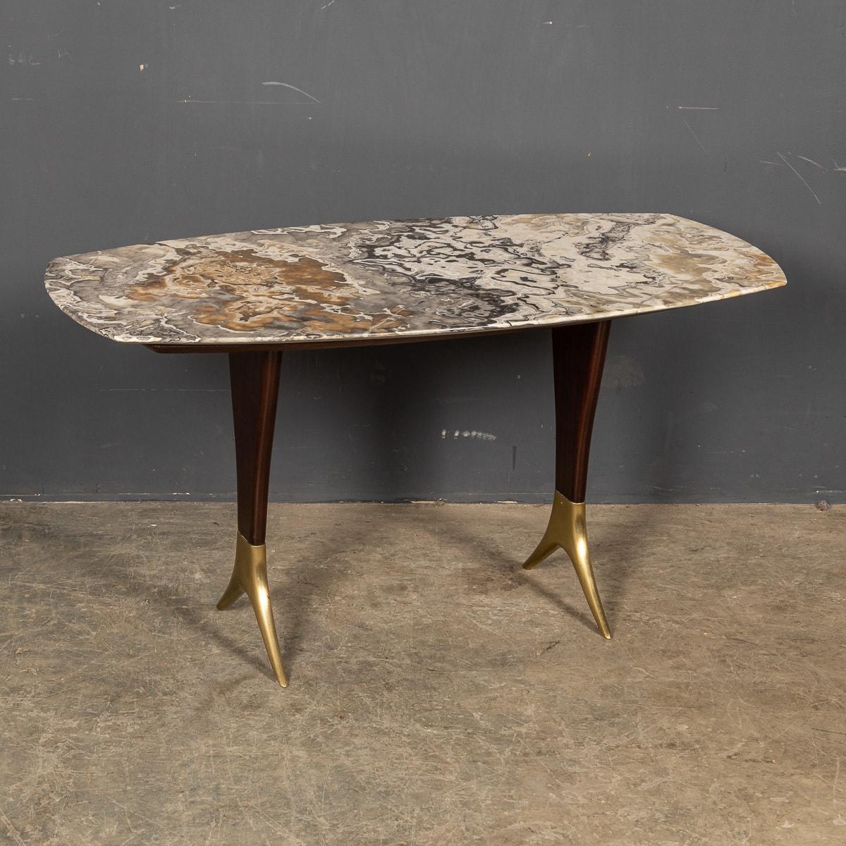 Mid 20th Century Italian marble topped coffee table with ebonised wooden legs capped in brass.

CONDITION
In Great Condition - wear consistent with age.

SIZE
Height: 51cm
Width: 100cm
Depth: 50cm