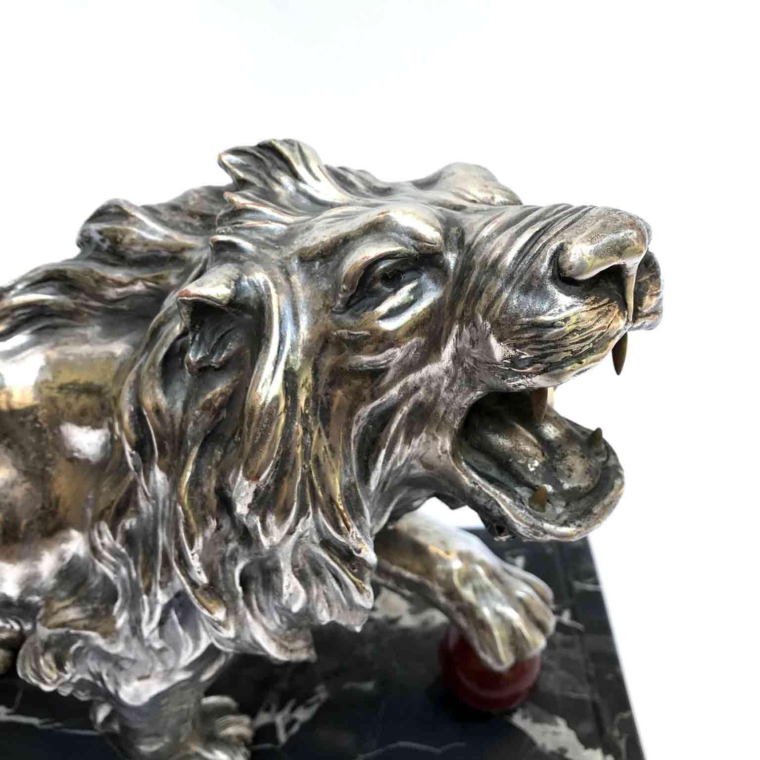 From Italy, an exquisite silver-leaf hand-molded terracotta statue of a Medici lion, by Michele Fabris, circa 1950. A miniature version of the Italian Medici lion statue from the Villa Medici in Rome and a favourite Neoclassical Grand Tour