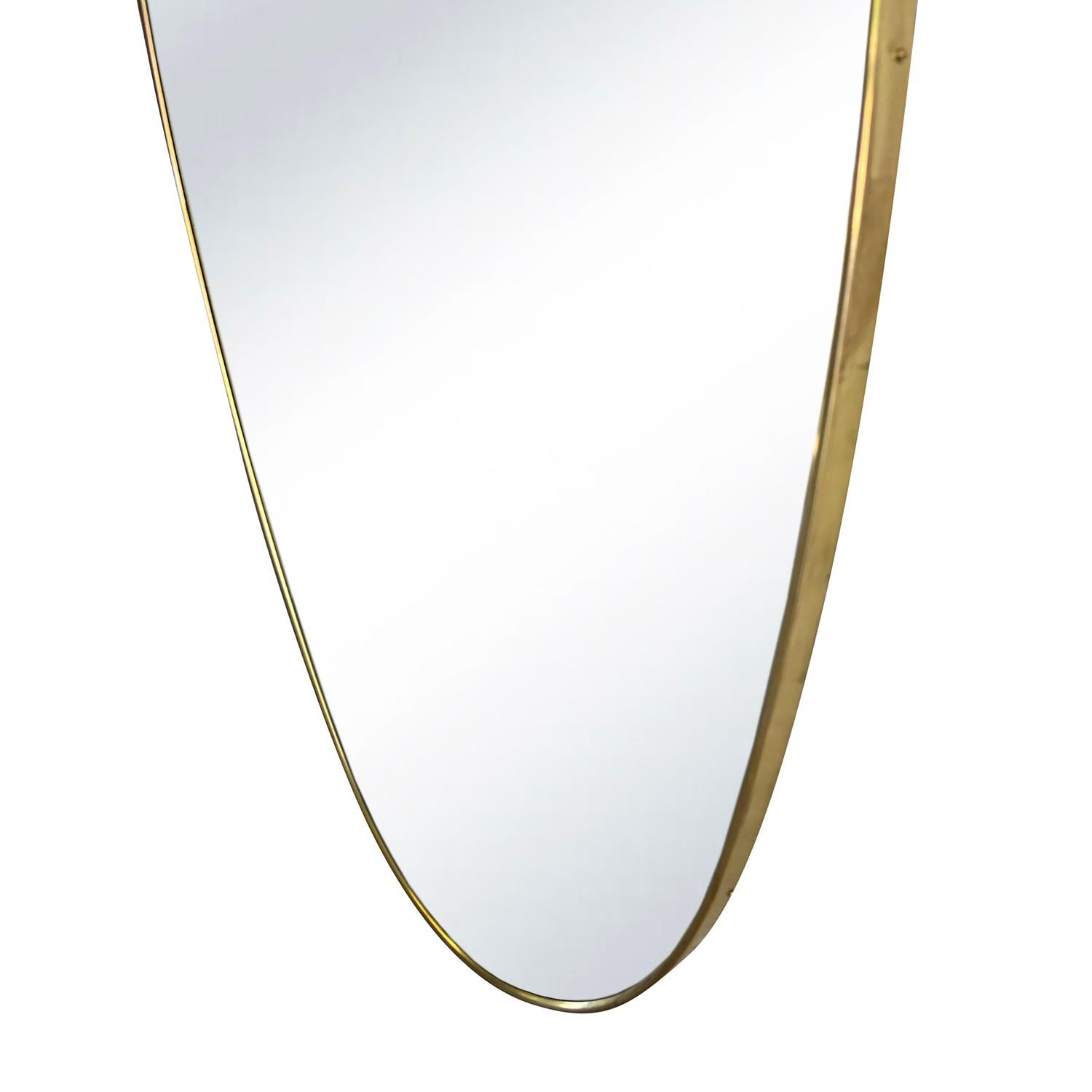 Metal 20th Century Italian Mid-Century Modernist Vintage Oval Brass Wall Glass Mirror For Sale