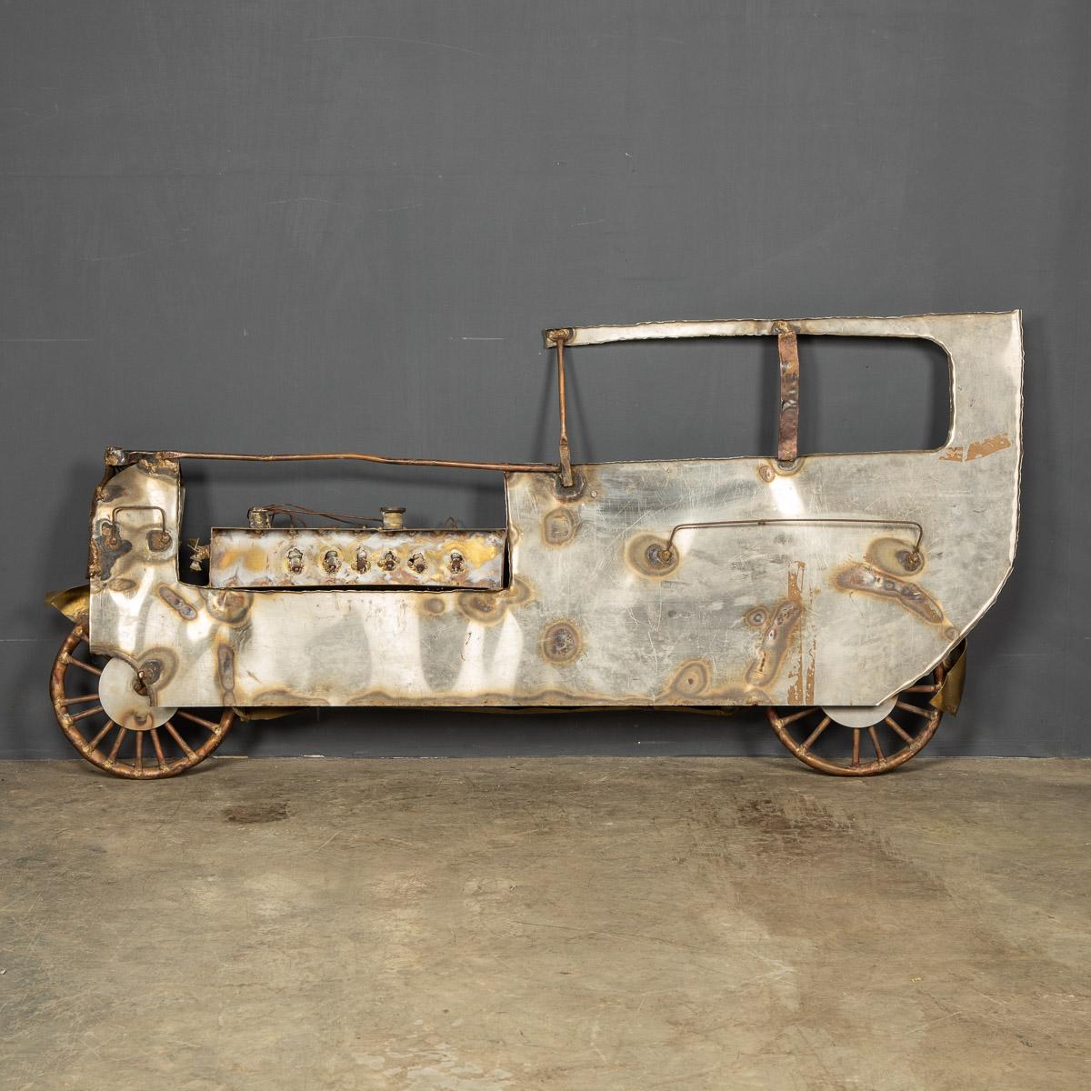 This classic car is handmade in Italy from brass, copper and steel, created in the mid 20th century as a piece of decorative fun and novelty.

CONDITION
In Good Condition - wear consistent with age.

SIZE
Width: 148cm
Depth: 8cm
Height: 68cm.
