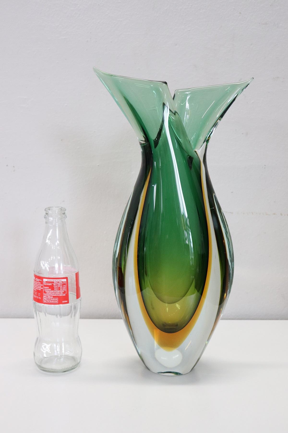 Refined design large vase in submerged Murano glass in shades of yellow and green made by Flavio Poli for Seguso, 1960s. This vase is characterized by a particular design shape. Vase of great refinement you will be truly fascinated when you see it.