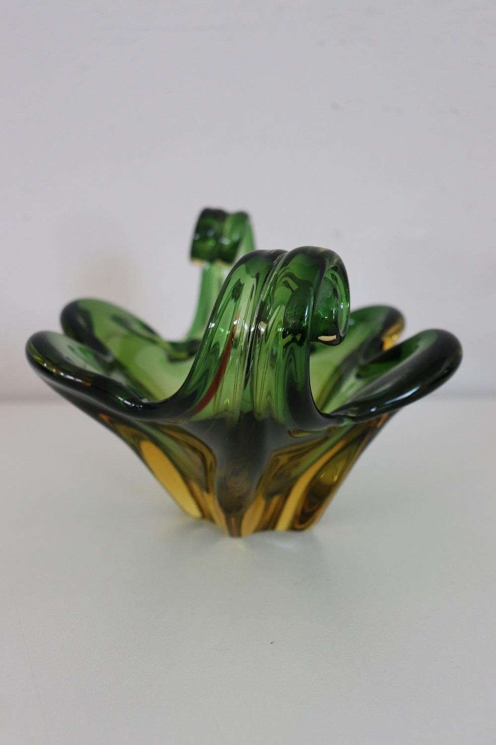 Refined design large vase in submerged Murano glass in shades of yellow and green made by Flavio Poli for Seguso, 1960s. This vase is characterized by a particular design shape. Vase of great refinement you will be truly fascinated when you see it.