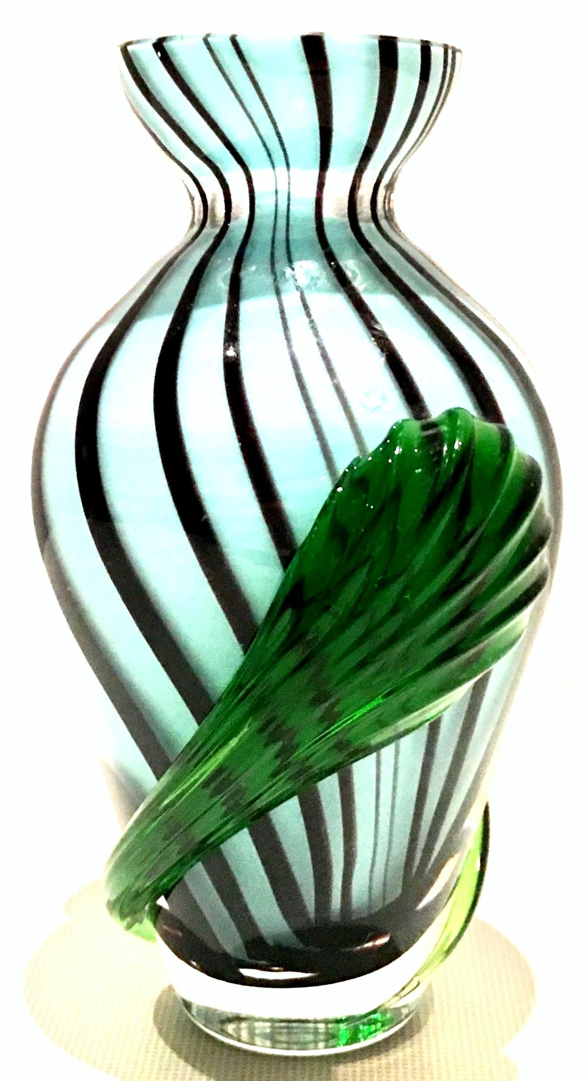 20th century unique Italian Murano glass light blue and black pinwheel bud vase with emerald green applied detail. Approximate circumference, 4