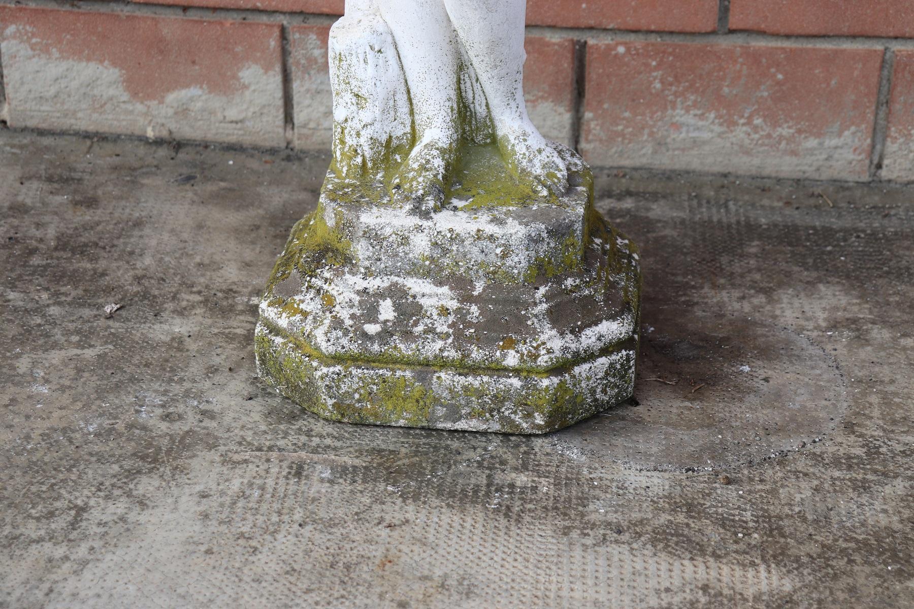 Beautiful refined garden statue in neoclassical style, circa 1930s main material stone mixed with gravel and cement. Beautiful and majestic statue. The stone shows signs of the passage of time. This statue is perfect for embellishing an important