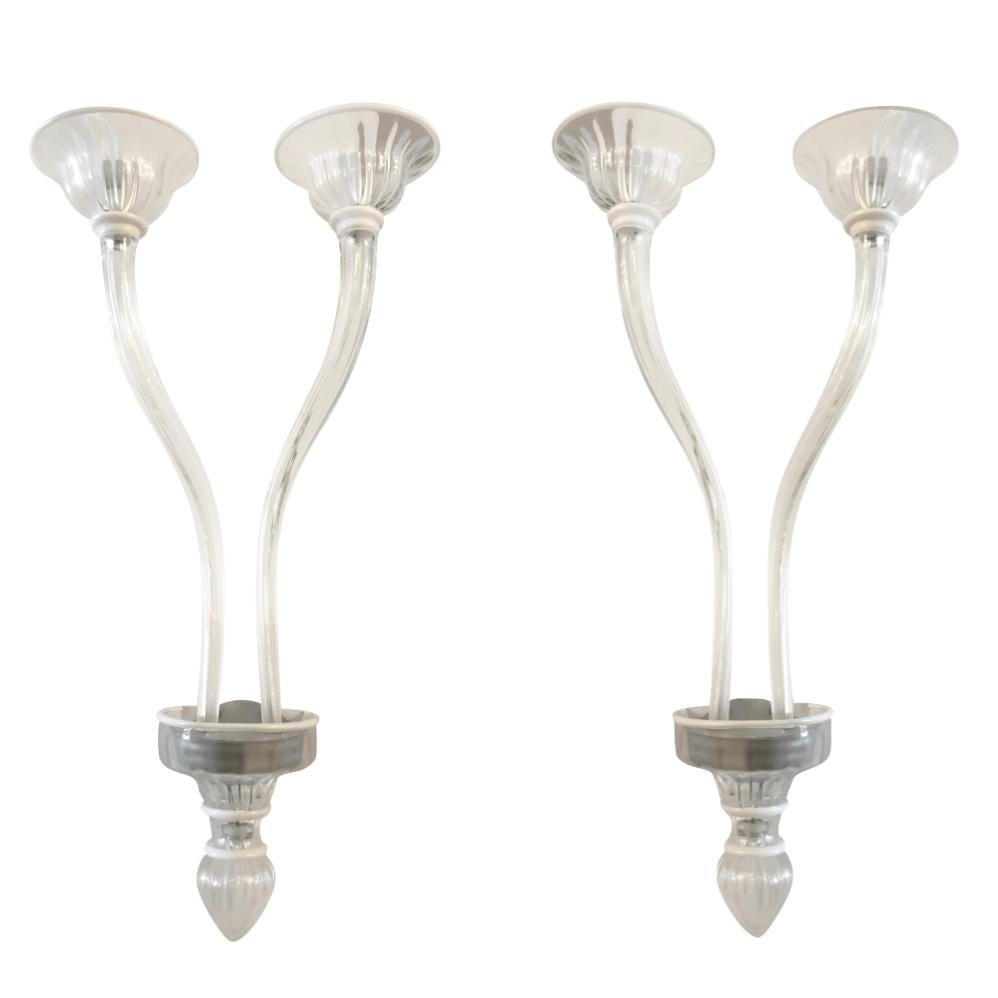 A vintage Mid-Century Modern Italian pair of double arm wall sconces made of hand blown smoked Murano glass, in good condition. Each of the sculptural wall lights, lamps are featuring a two light socket. The wires have been renewed. Wear consistent