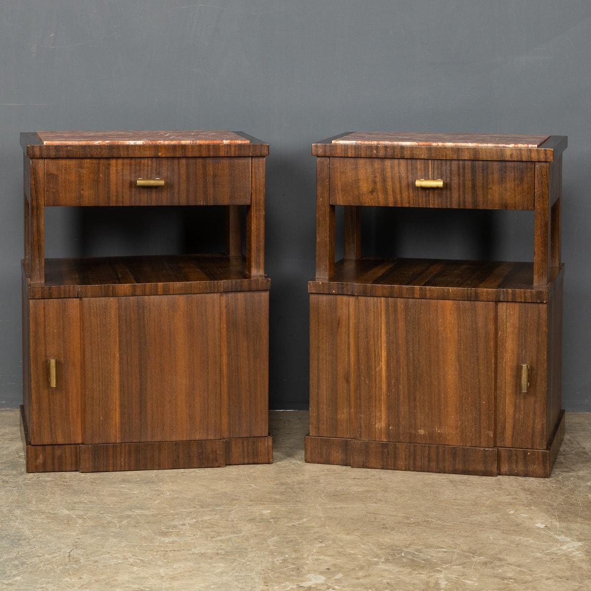 Mid-20th century pair of Italian bedside cabinets, made out of kingwood with a rose marble top. They each with a single drawer and cupboard.

CONDITION
In great condition - wear as expected.

SIZE
Width: 44cm
Height: 60cm
Depth: 40cm.