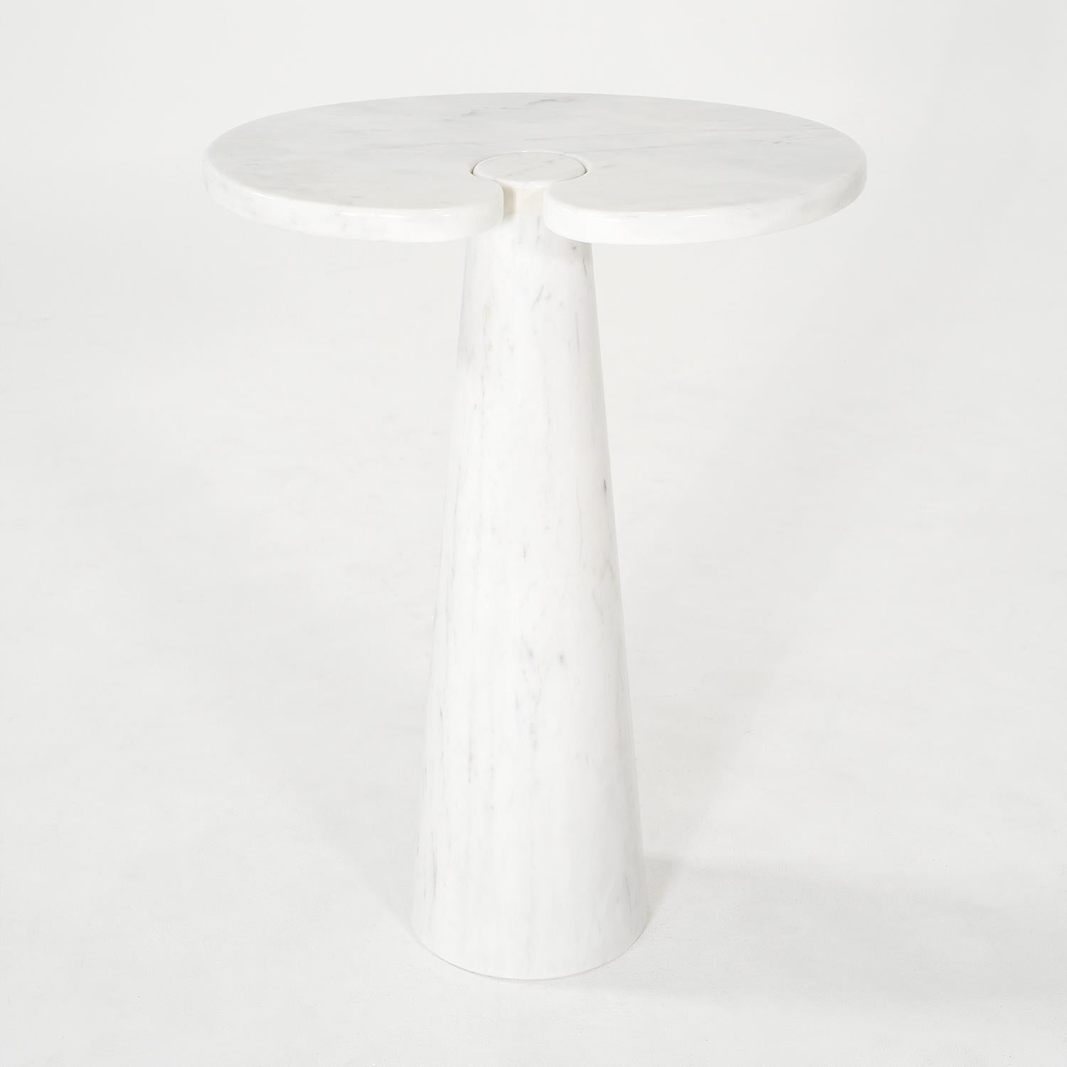 A white-grey, vintage Mid-Century modern Italian pair of freestanding side, corner tables made of hand crafted Biancone marble, designed by Angelo Mangiarotti and produced by Skipper in good condition. The half round, tall Eros end tables have no