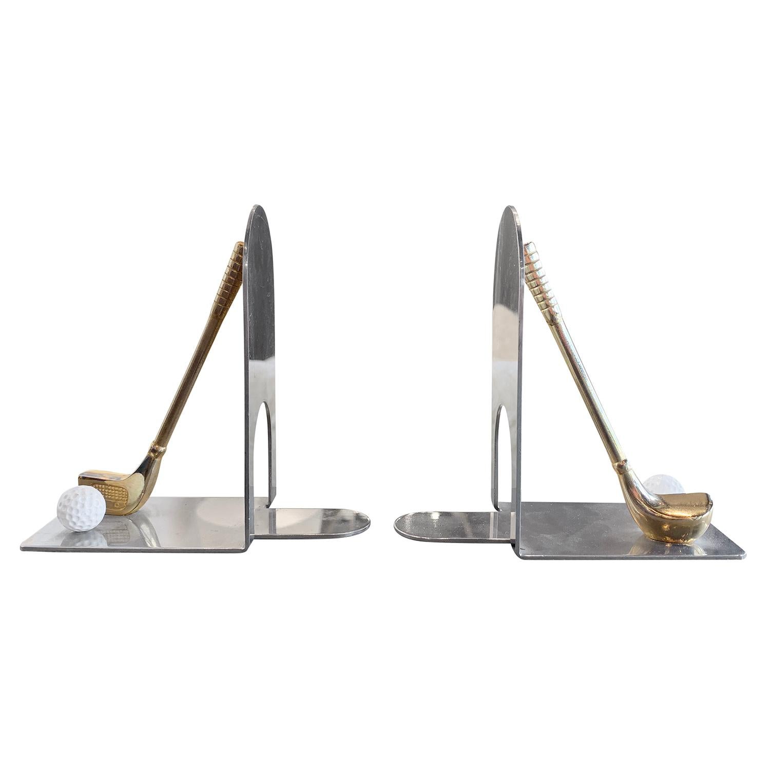 A silver, vintage Mid-Century Modern Italian pair of bookends made of hand crafted chromed metal and brass, depicting a golf ball, in good condition. Wear consistent with age and use, circa 1960, Italy.