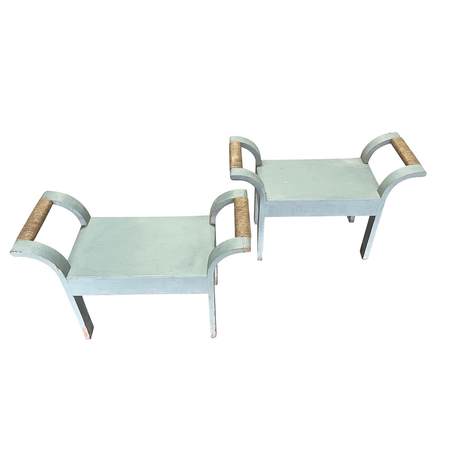 A vintage Mid-Century modern pair of stools made of hand crafted painted Pinewood produced by Di Sgabelli, in good condition. The detailed rectangular benches have a wide outstretched side backrests, particularized by straw in the center, standing