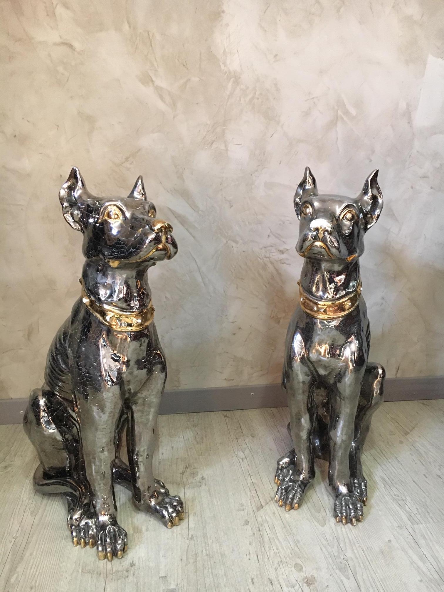 Rare and exceptional 20th century Italian pair of silver and golden patina ceramic dogs (Doberman).
Very good condition except one broken claw.
