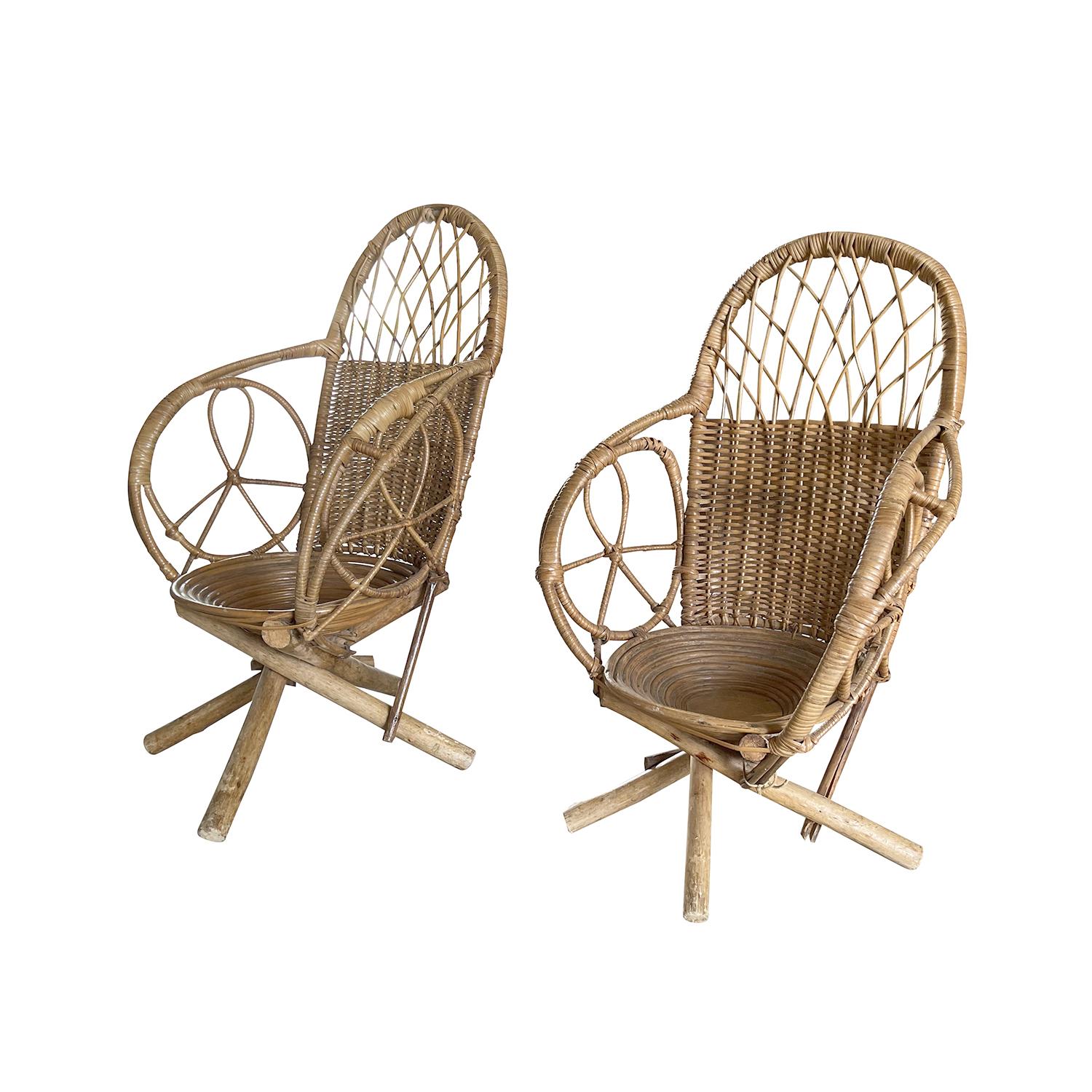 A rare, vintage Mid-Century Modern Italian pair of children chairs made of handcrafted Rattan and wicker in the style of Franco Albini, in good condition. The very decorative seat spiral shell was made of rattan, on four rustic wooden legs. Wear