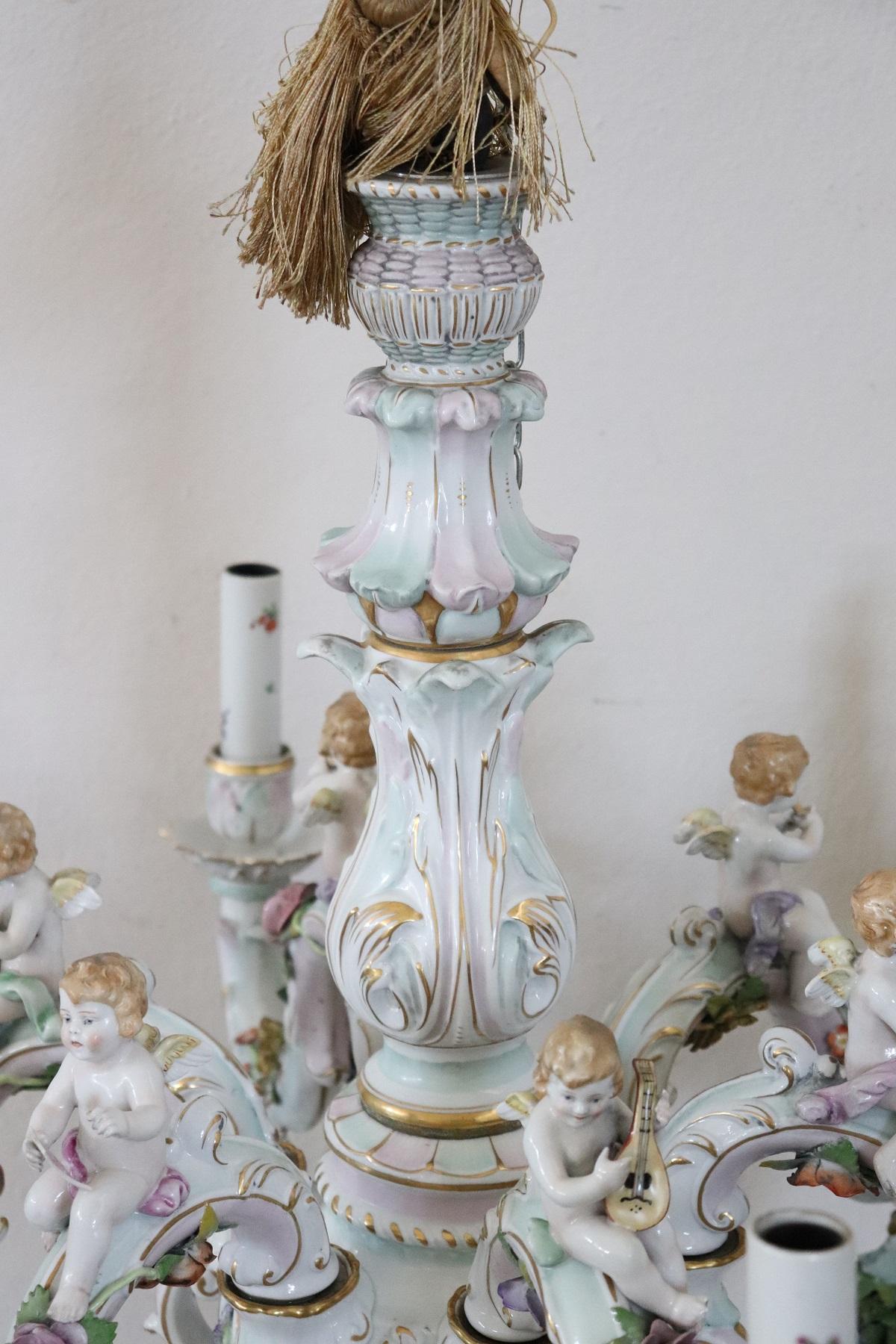 20th Century Italian Porcelain Chandelier Decorated with Flowers and Cherubs In Excellent Condition In Casale Monferrato, IT