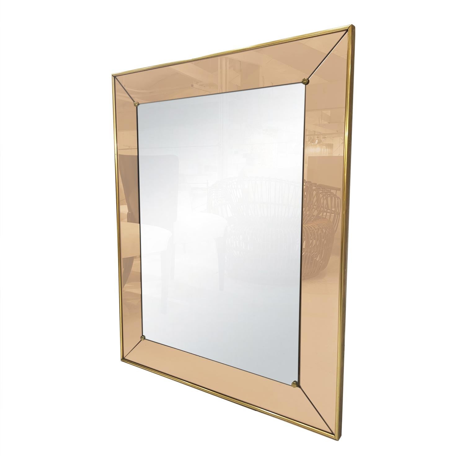 A rectangular, vintage Mid-Century Modern Italian wall mirror made of hand blown colored glass with its original mirror glass, produced by Cristal Art, in good condition. Wear consistent with age and use. circa 1960, Turin, Italy.

Cristal Art was