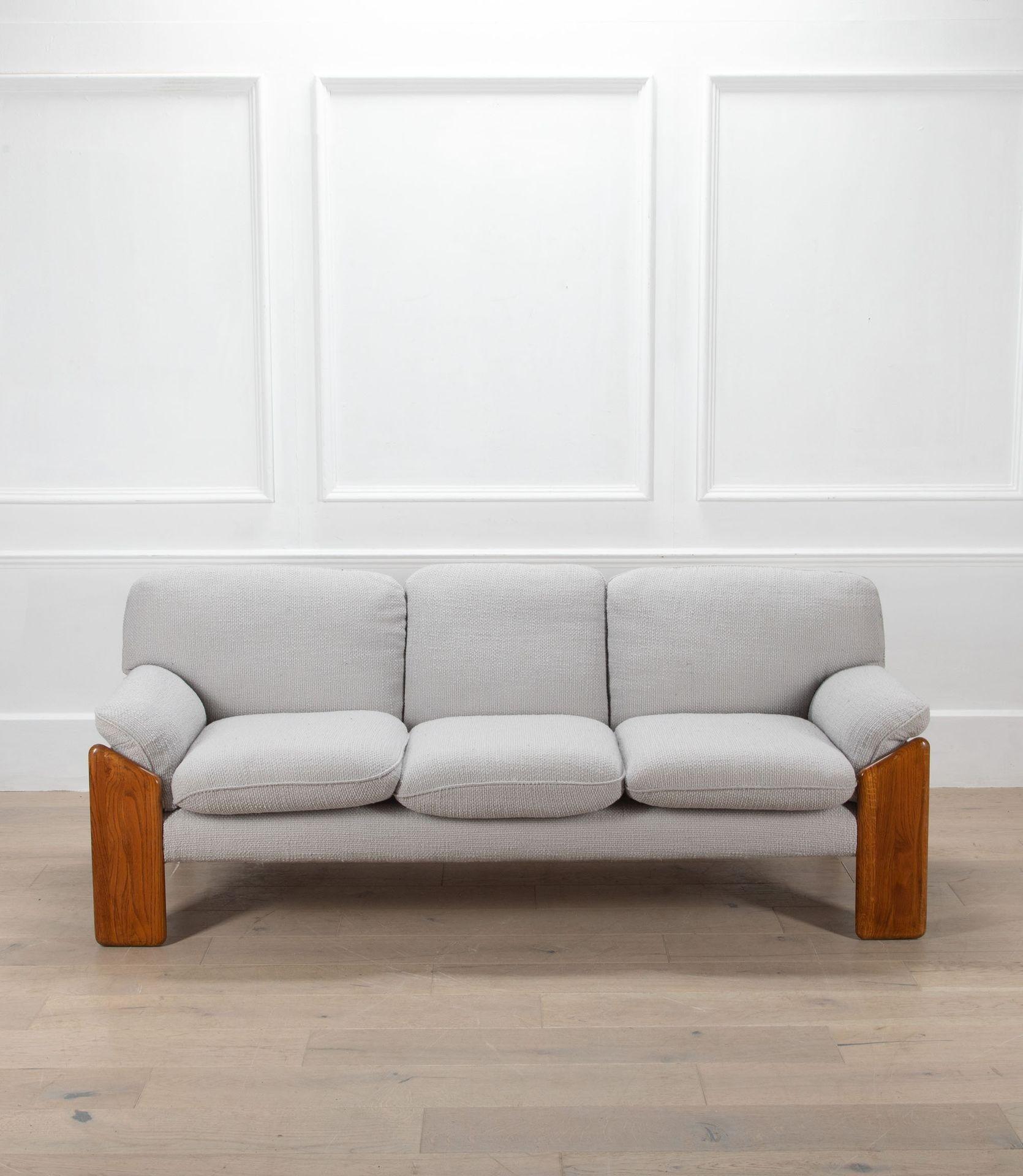 Lovely mid-20th Century Italian Sapporo three seater sofa. 
In oak and reupholstered in light grey bouclet with soft comfortable cushions. 
Circa 1970.
