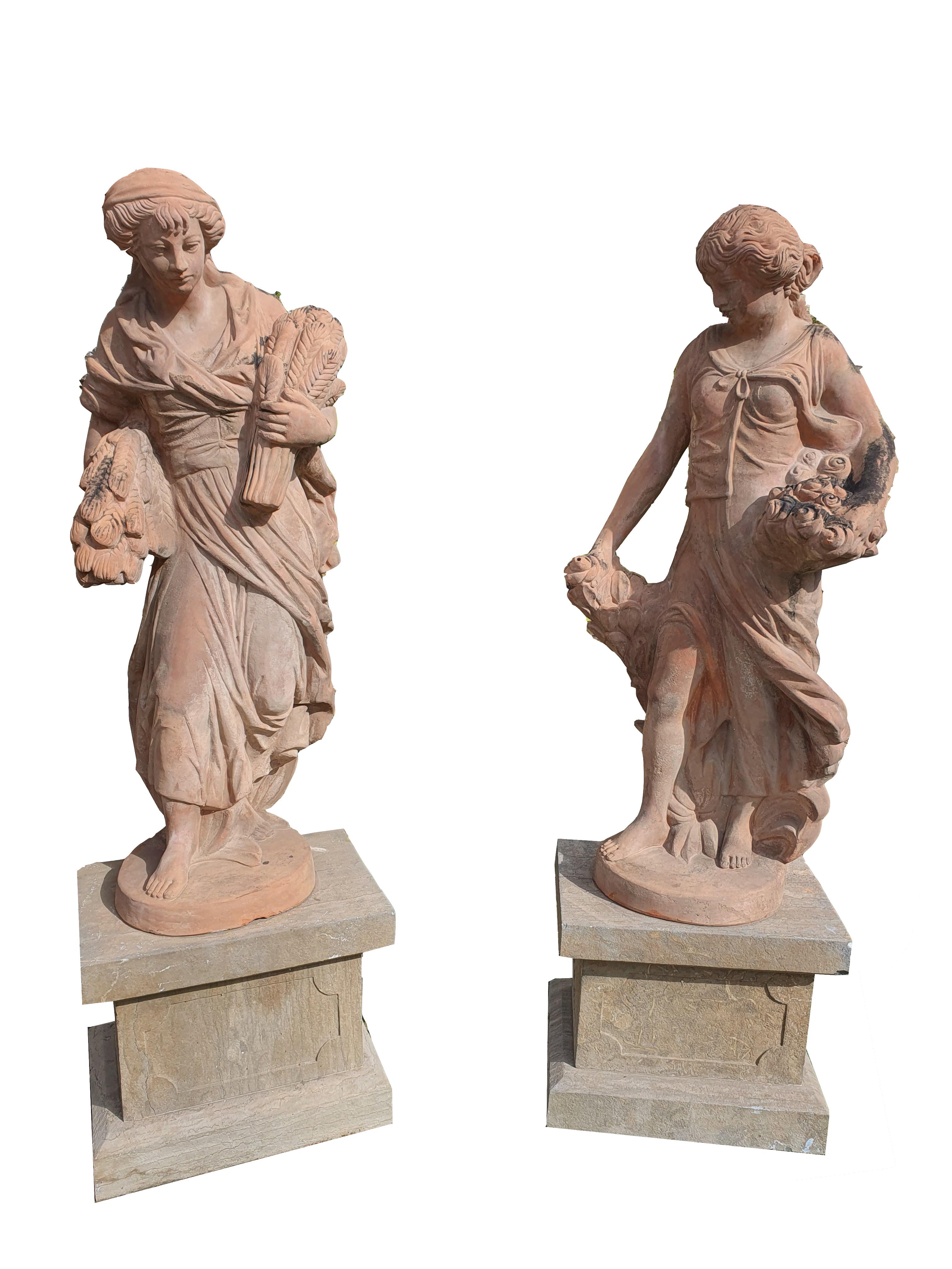 Finely crafted Italian terracotta sculptures depicting the four seasons. On stone bases prior to the period of making the statues. The sculptures are from the early 1900s, the bases from the late 19th century.