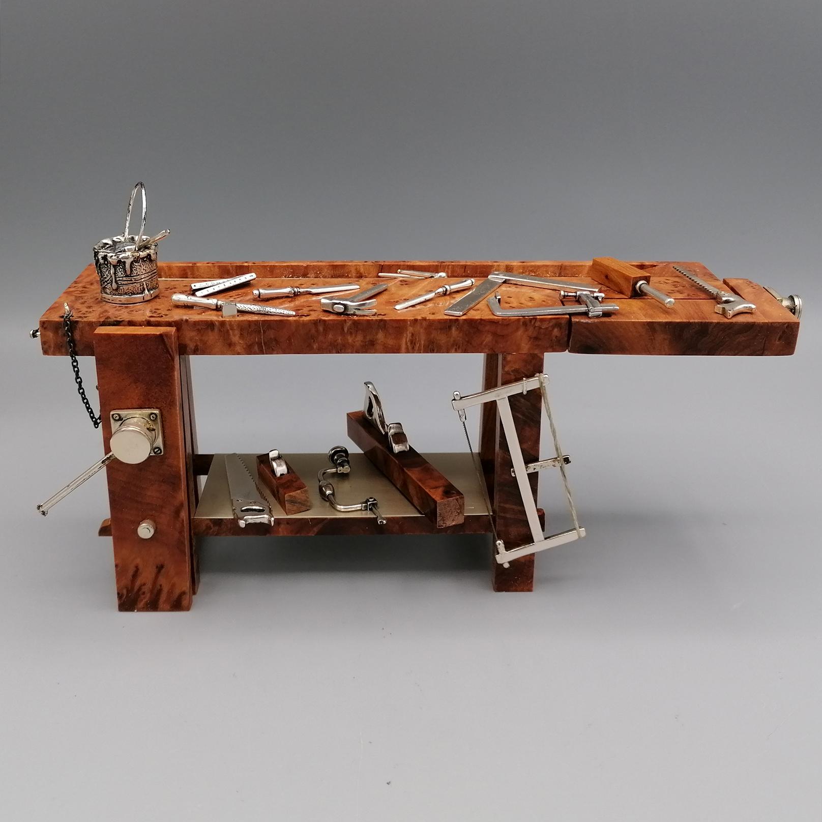 Silver and wood carpenter workbench miniature.
The miniature was made entirely by hand in Italy, Arezzo, Tuscany by the Creazioni Sacchetti silversmith.
Silverware that closed its business several years ago.
It is no longer possible to remake this