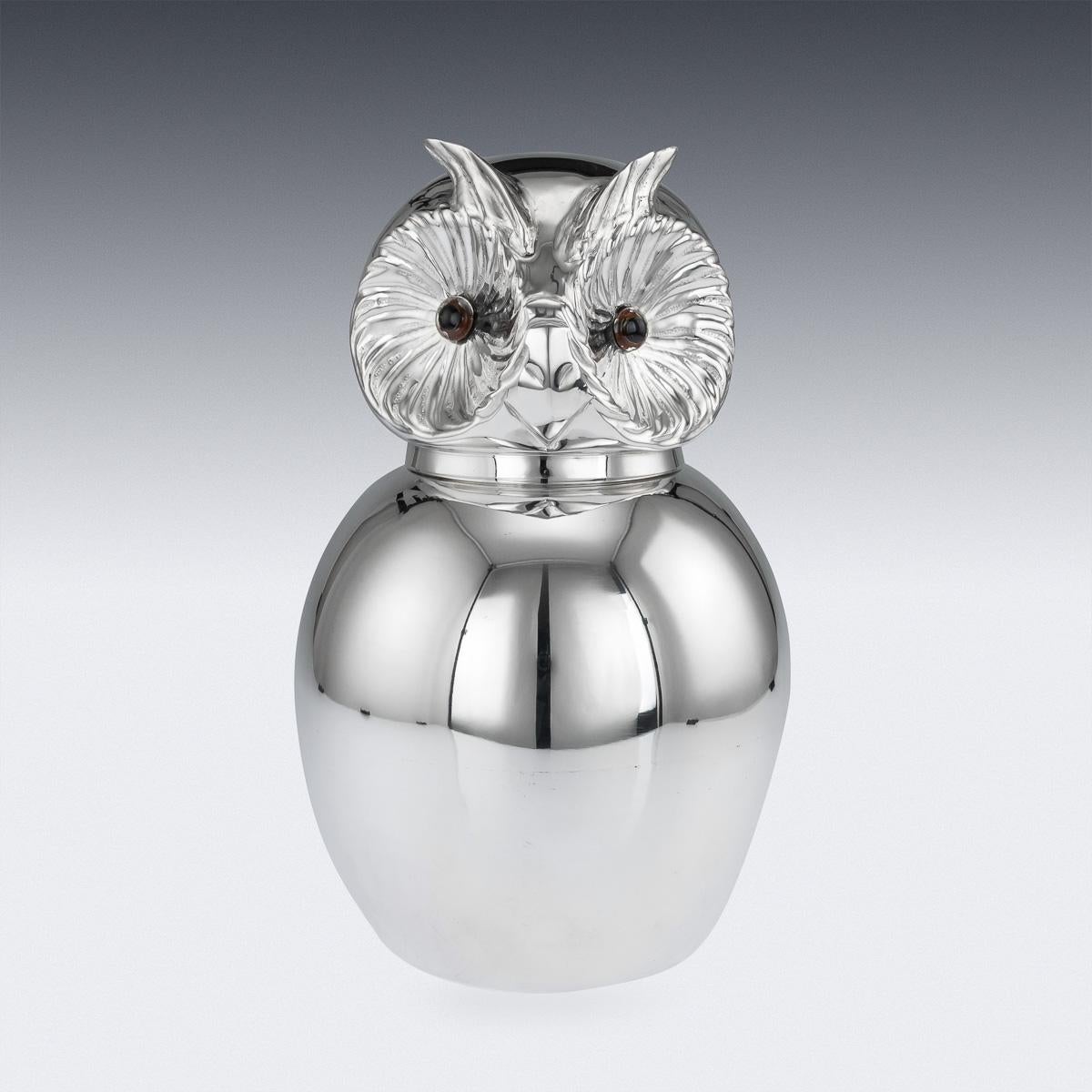 Novelty 20th Century Italian silver plated owl shaped wine cooler. Of large size and realistically modelled with a hinged head, set with glass eyes, inside fitted with a removable liner, a true conversation piece, that will add novelty and fun to