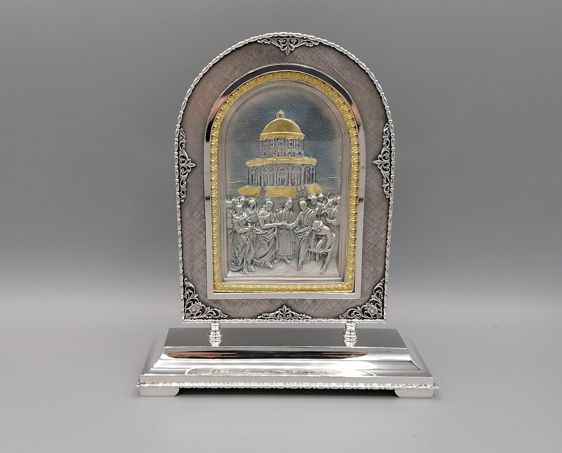 Portal in chiseled solid silver depicting the 