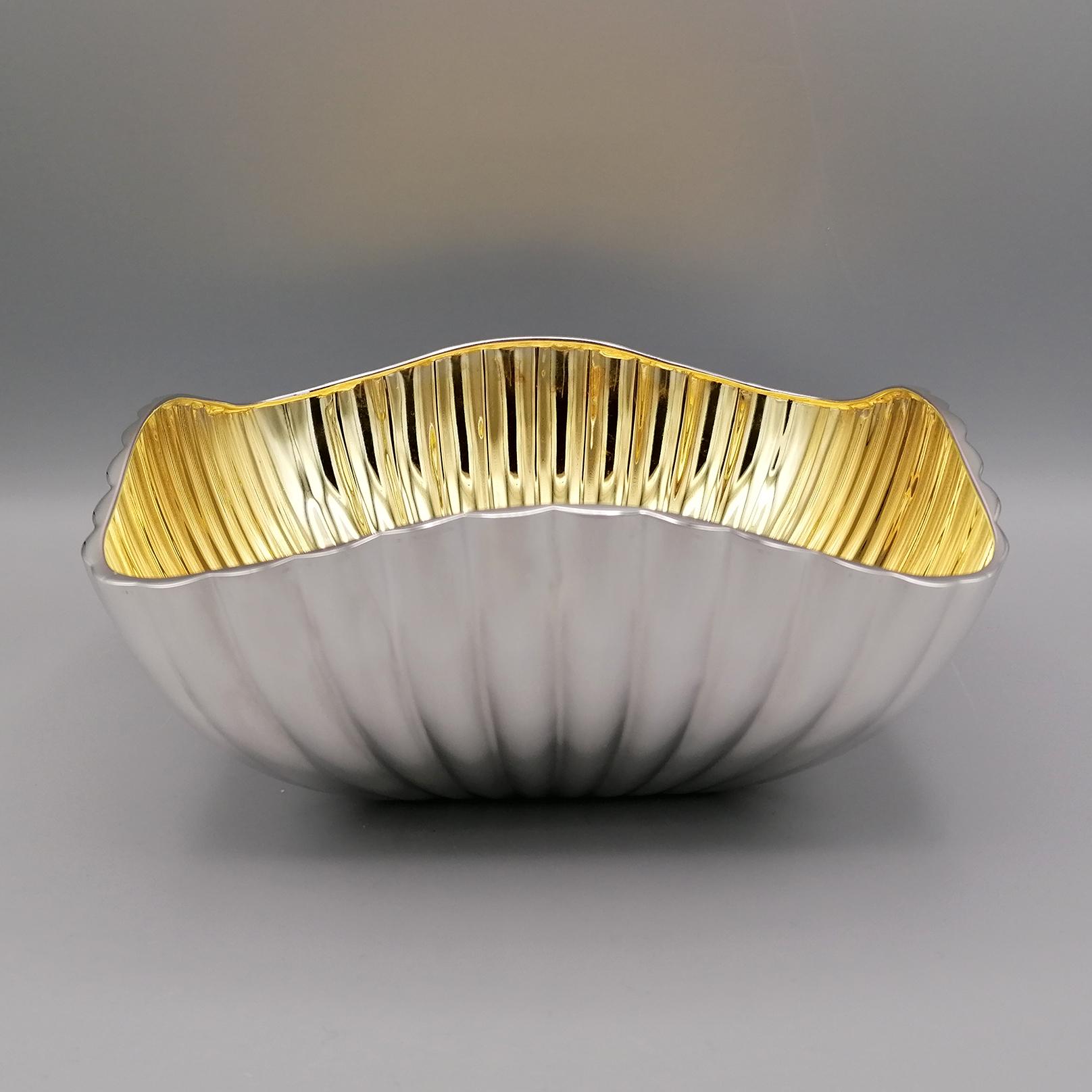 Solid silver bowl completely handmade, shaped and square with cannetè design made with the embossed and chisel technique. 
The bowl was thickly gilded with 24Kt gold only on the inside, while the outside remained natural silver. 

By Pria & Sari