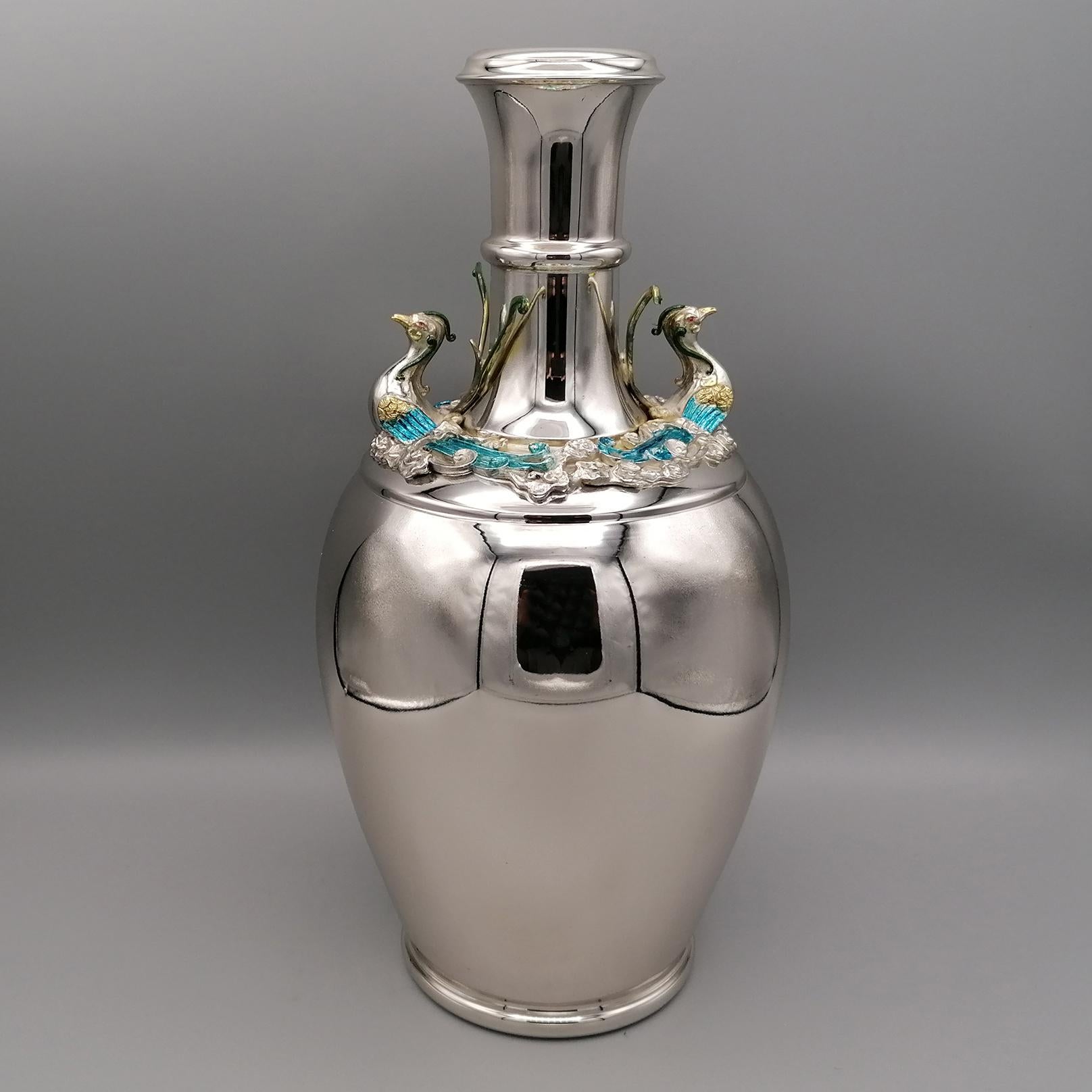 Vase in solid silver 800 with enamelled Phoenix,
replica of a vase of the
Ching Dynasty 1644 - 1911
Chia Ching period 1796 - 1821

Vase from the 