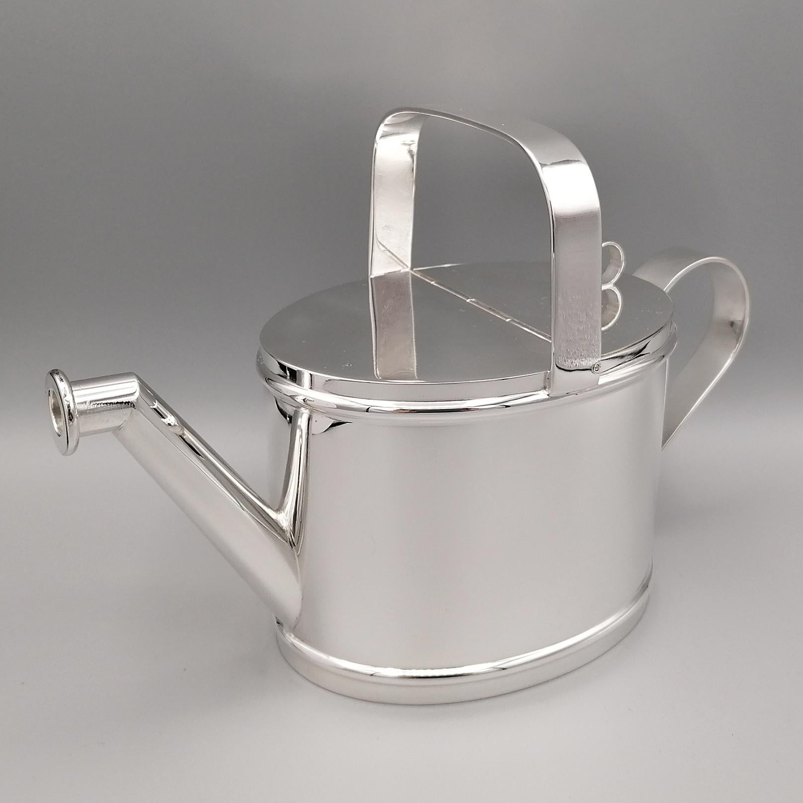 Nice cruet in solid 800 silver. Completely handmade, it faithfully reproduces the shape of a watering can. It can be used for pouring other types of liquids or sauces. 
Very elegant object on your table that will amaze your guests. 
It can also be a