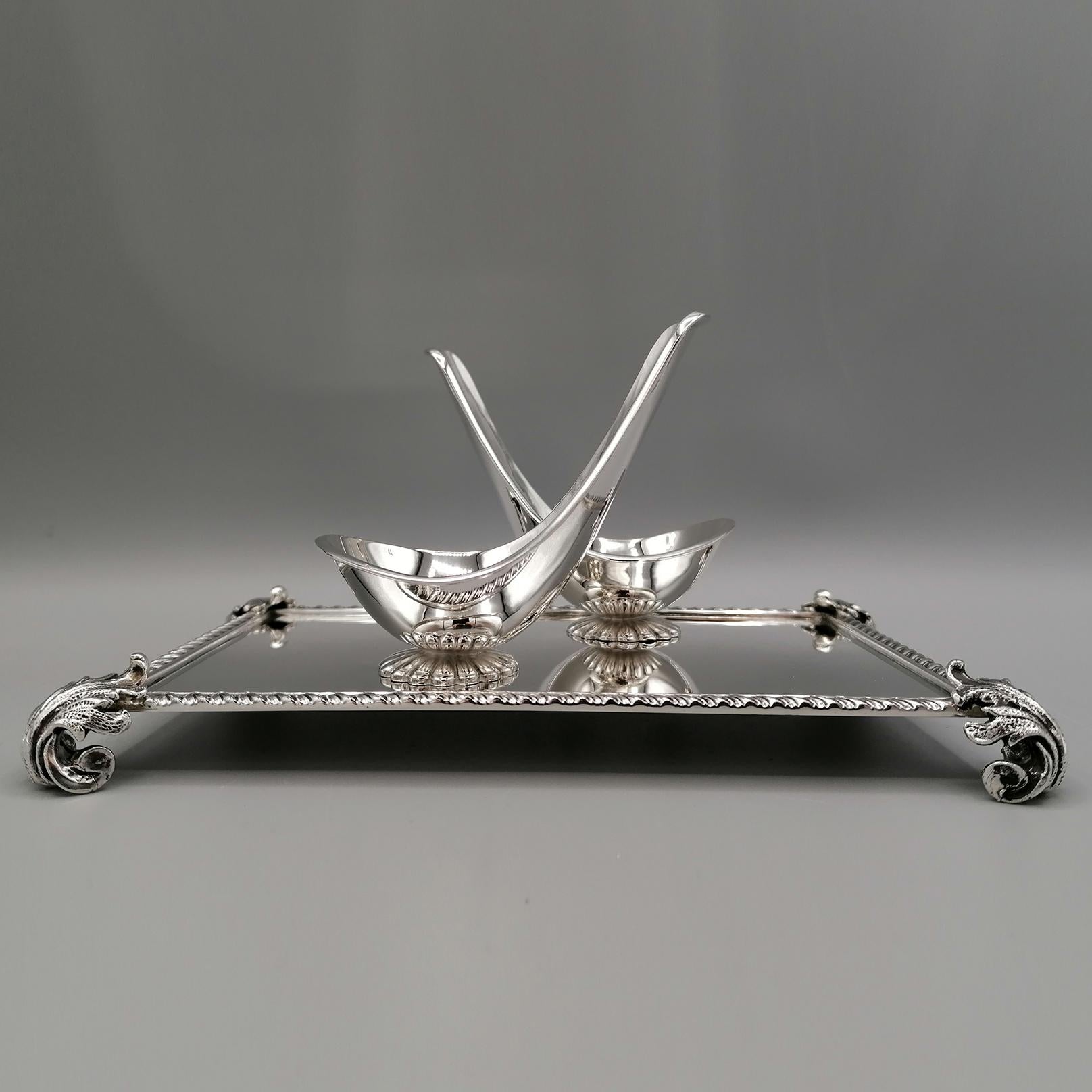 Queen Anne style double pipe holder in solid silver. 
The pipe holders have a round fluted base pods and are fixed on the silver tray with small bolts that are removable for cleaning.
The tray has the Classic Queen Anne style edge and is raised by