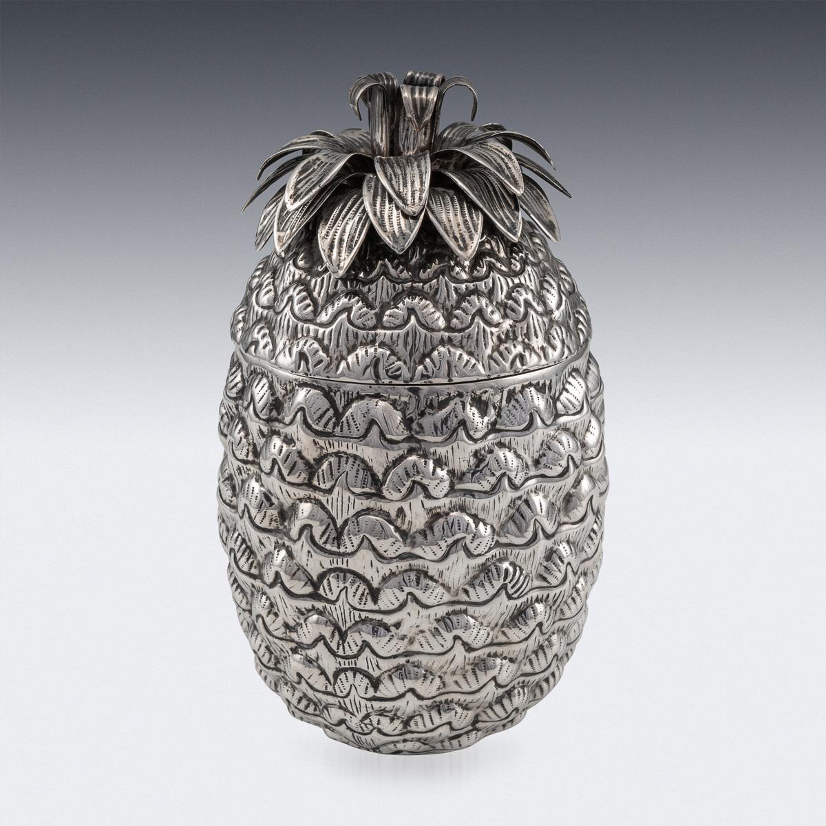 Novelty 20th century Italian solid silver ice bucket, in a form of a pineapple, removable lid mounted with realistically modelled leaves and richly gilt interior. Hallmarked Italian silver, Alessandria (AL), year 1968-present.

Condition

In